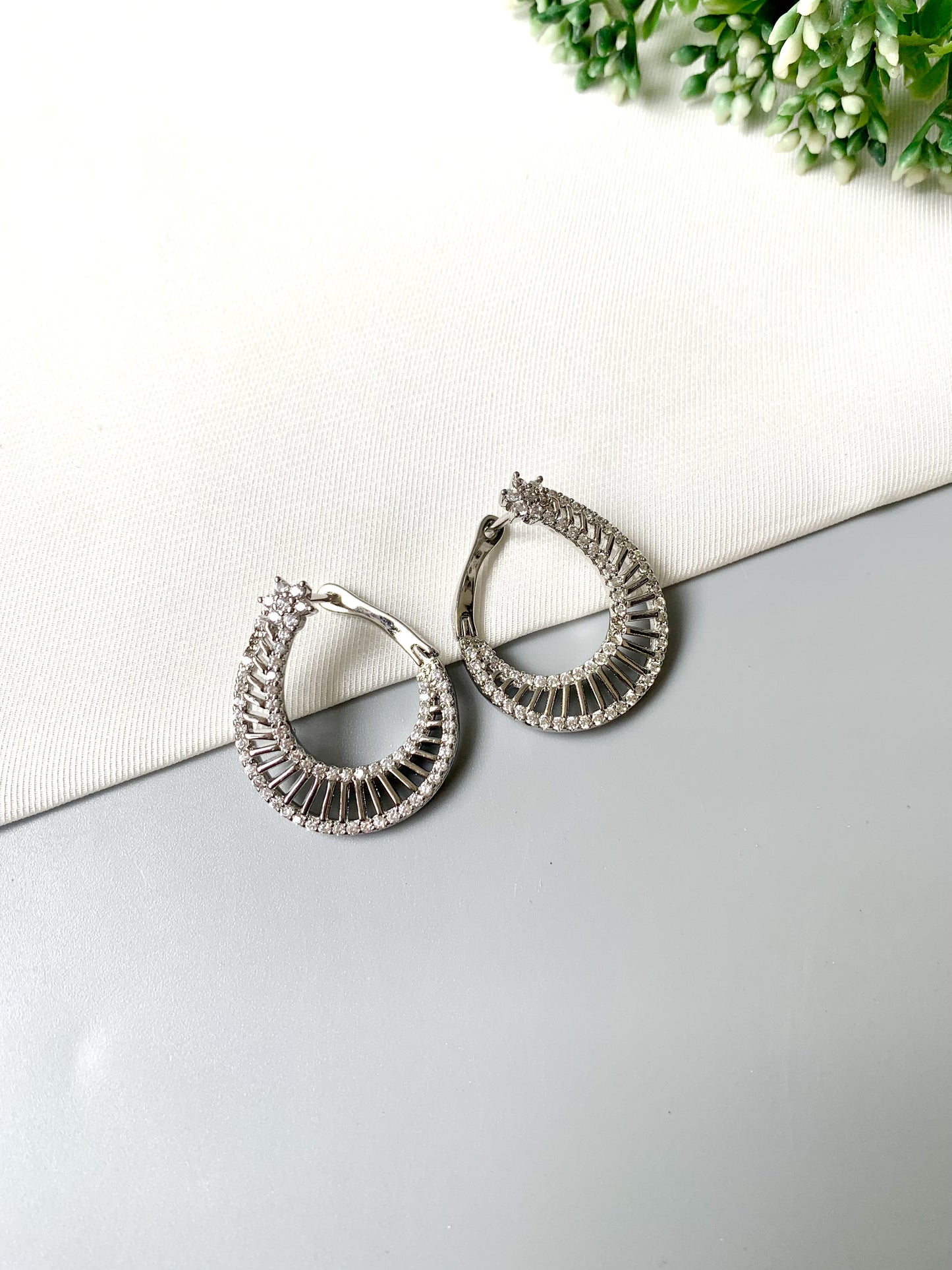 Astrella Hoops – Rhodium plated designer earrings with American Diamonds from Zamal Jewels FORMA Collection