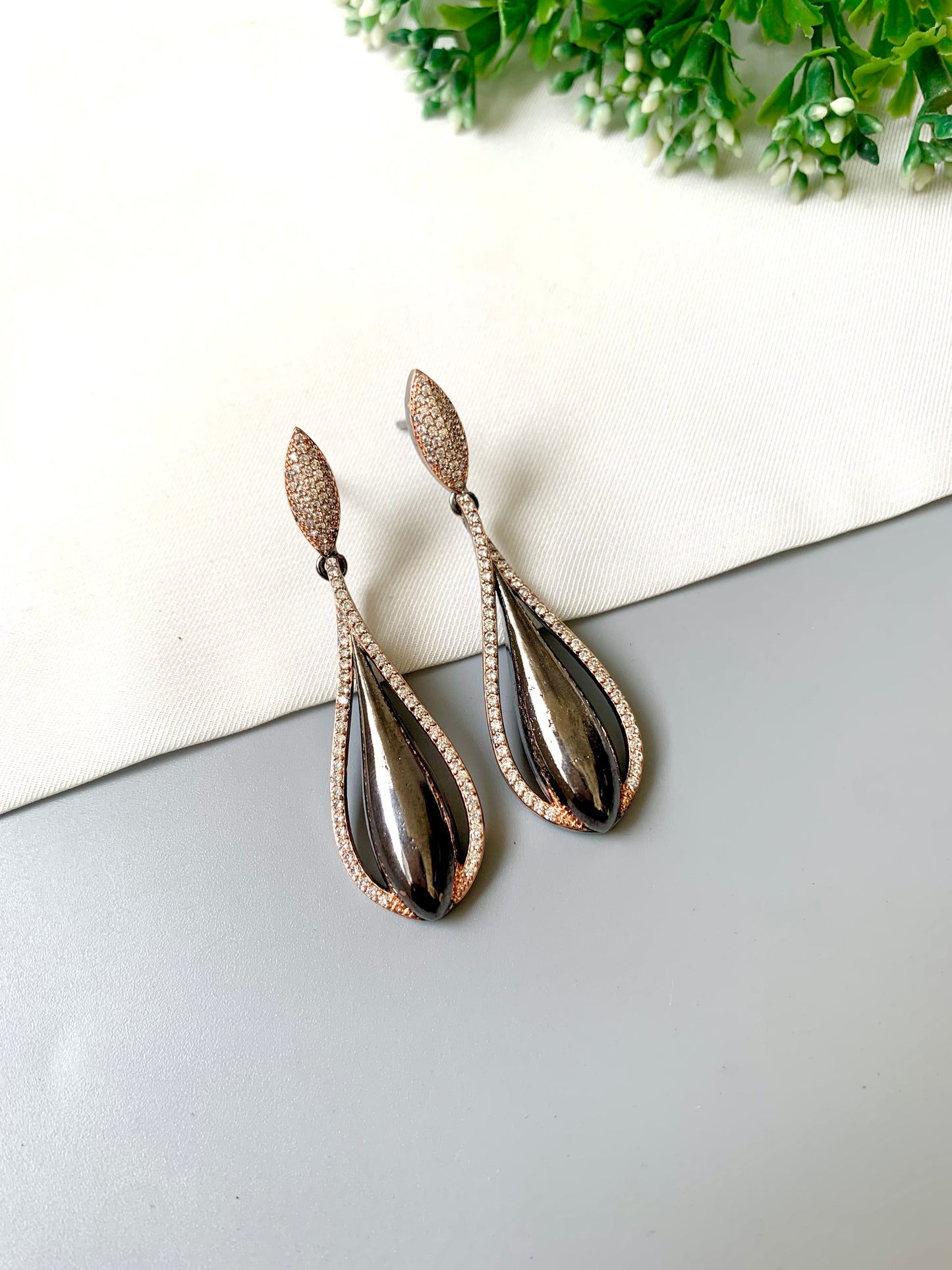 Elira Noir Earrings in 22kt Rose Gold Black oxidized plating with American Diamonds by Zamal Jewels