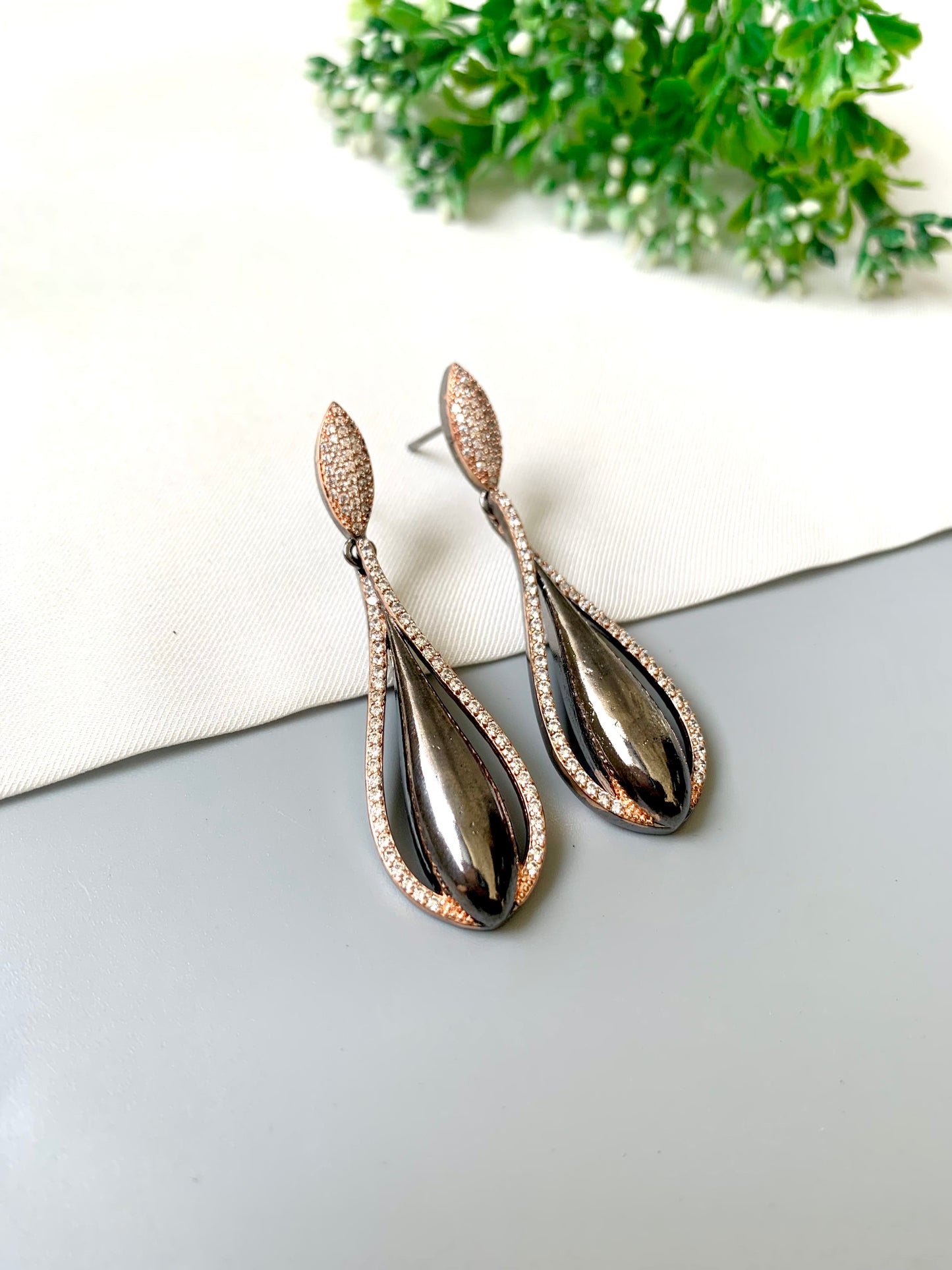 Elira Noir Earrings in 22kt Rose Gold Black oxidized plating with American Diamonds by Zamal Jewels