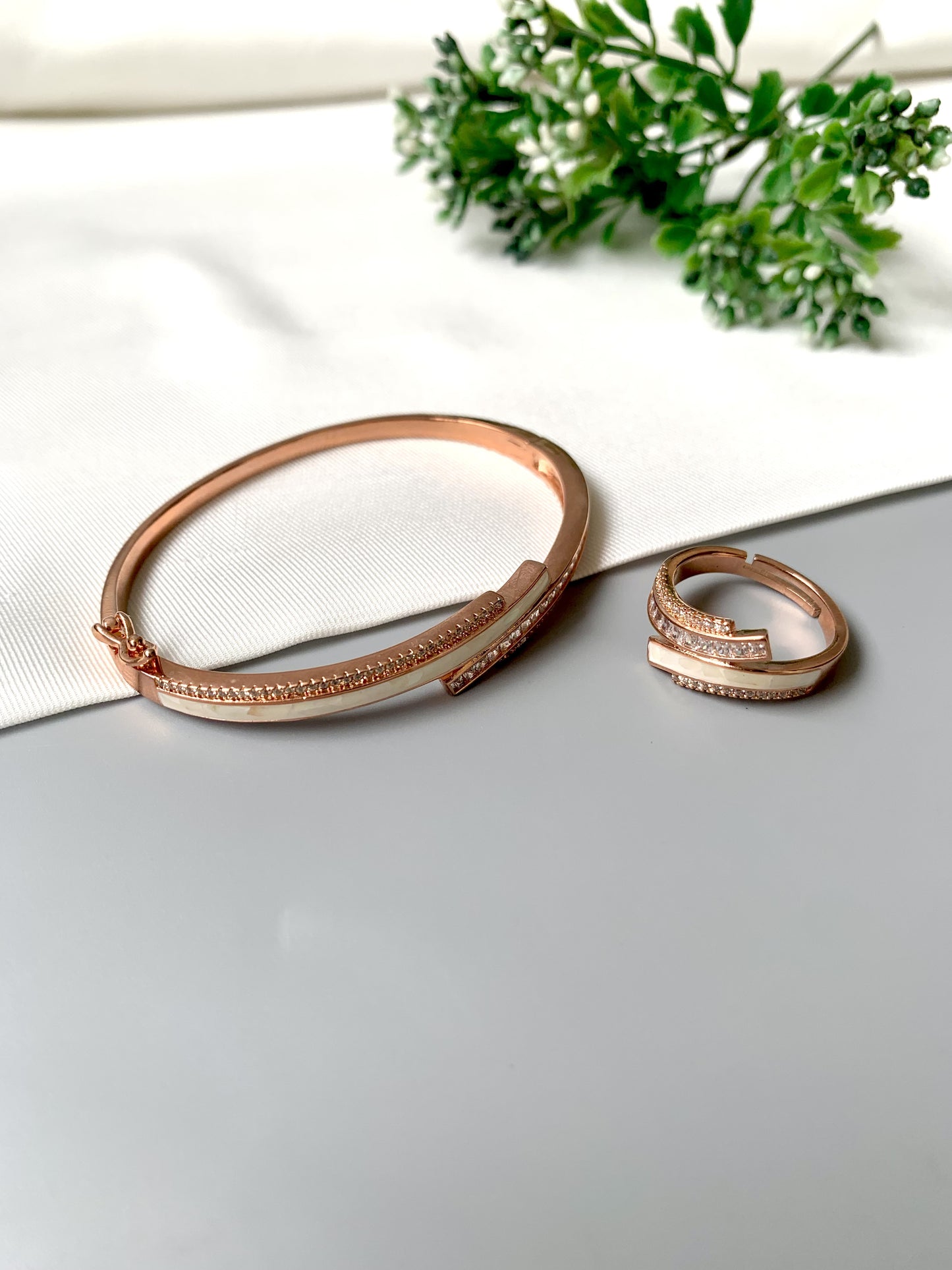 Rose gold handcrafted bangle and adjustable ring combo with American Diamonds and real Mother of Pearls by Zamal Jewels