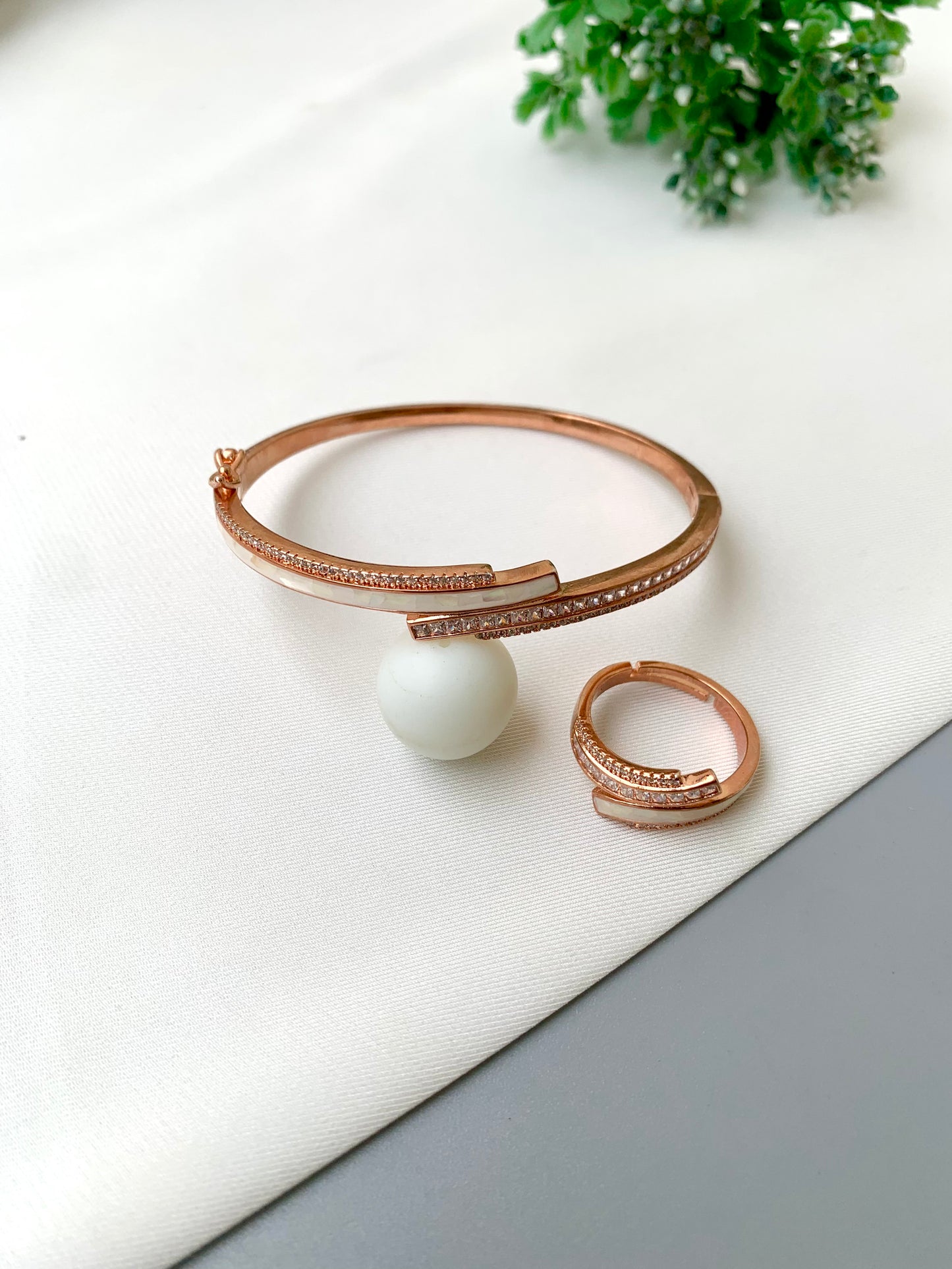 Gabana handcrafted 22kt rose gold bracelet and adjustable ring combo with American Diamonds and real Mother of Pearl