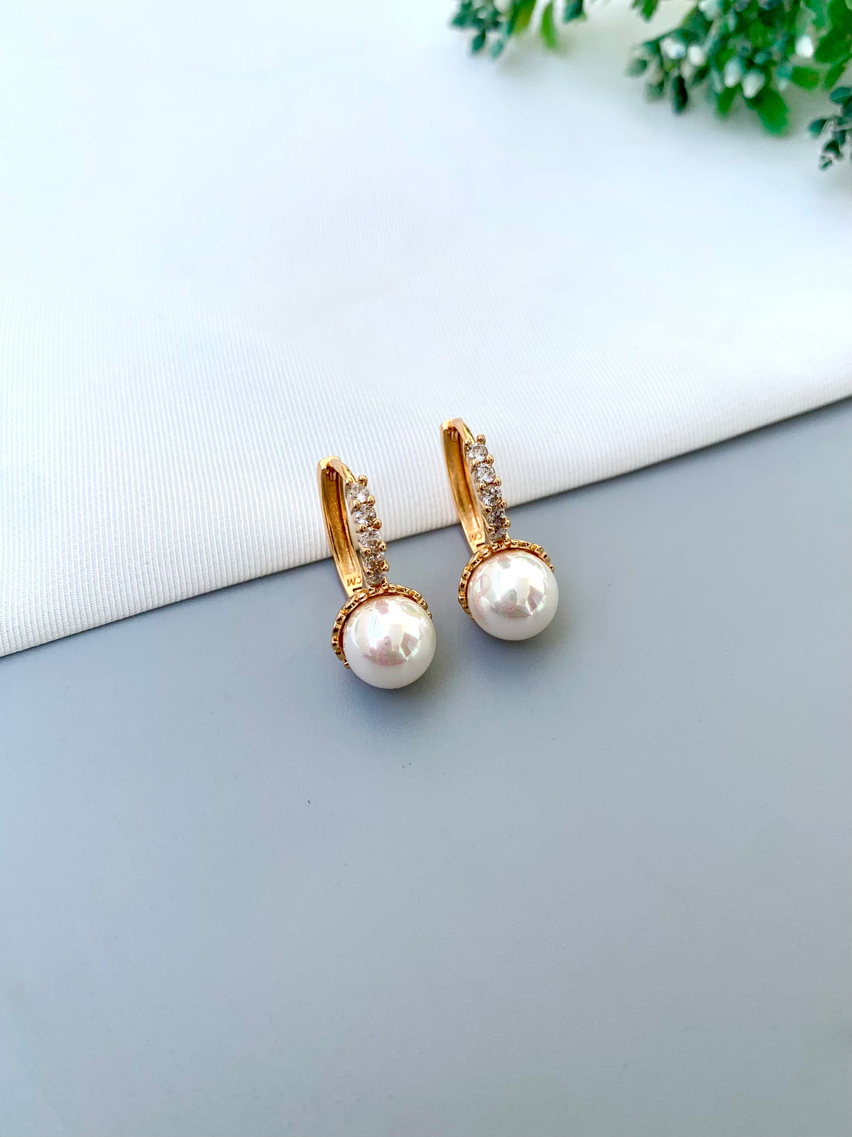 Geena handcrafted 22kt Gold plated studs with American Diamonds and semi-precious Pearls