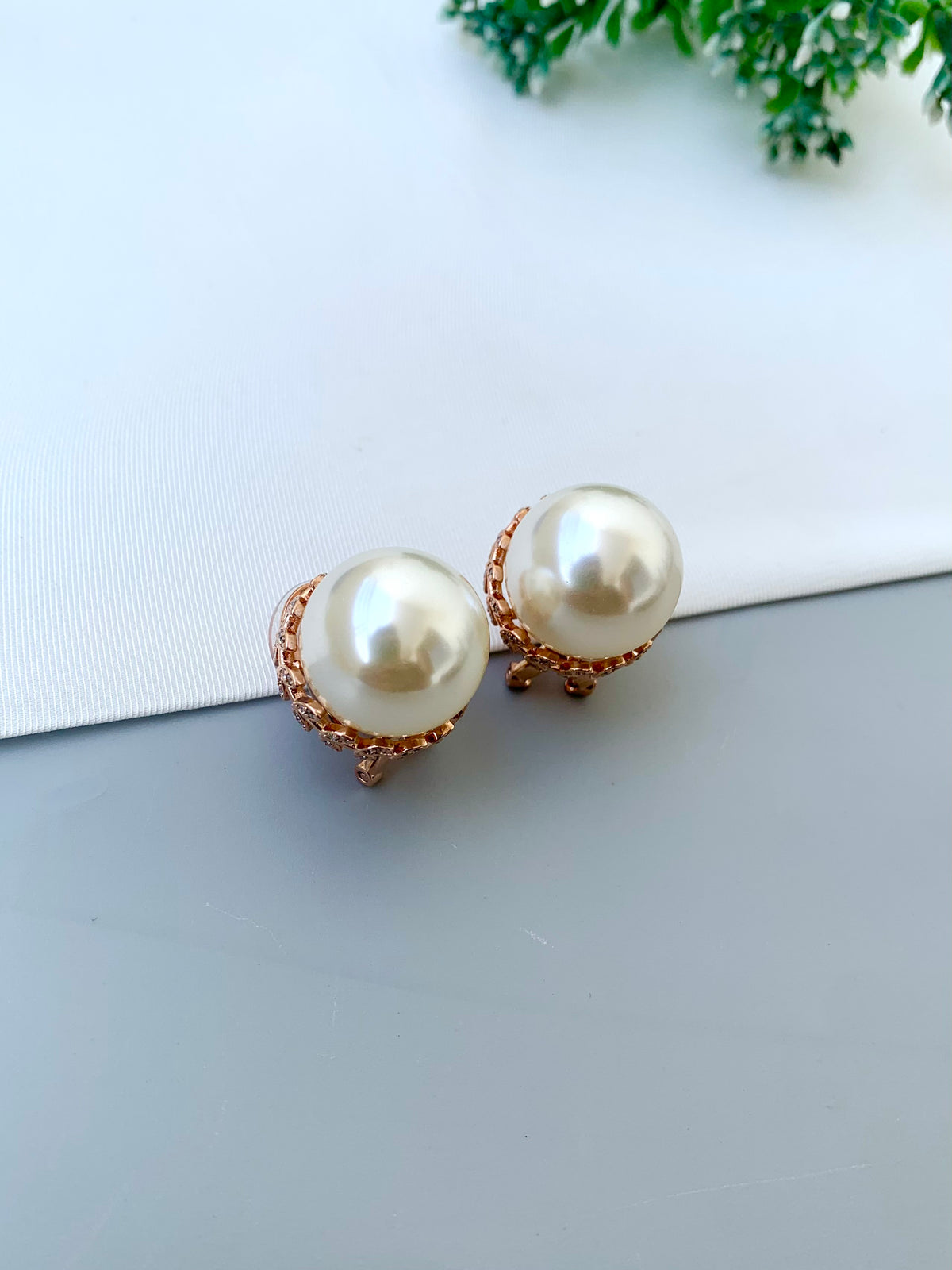 Naniya handcrafted 22kt Rose Gold plated studs with American Diamonds and semi-precious Pearls