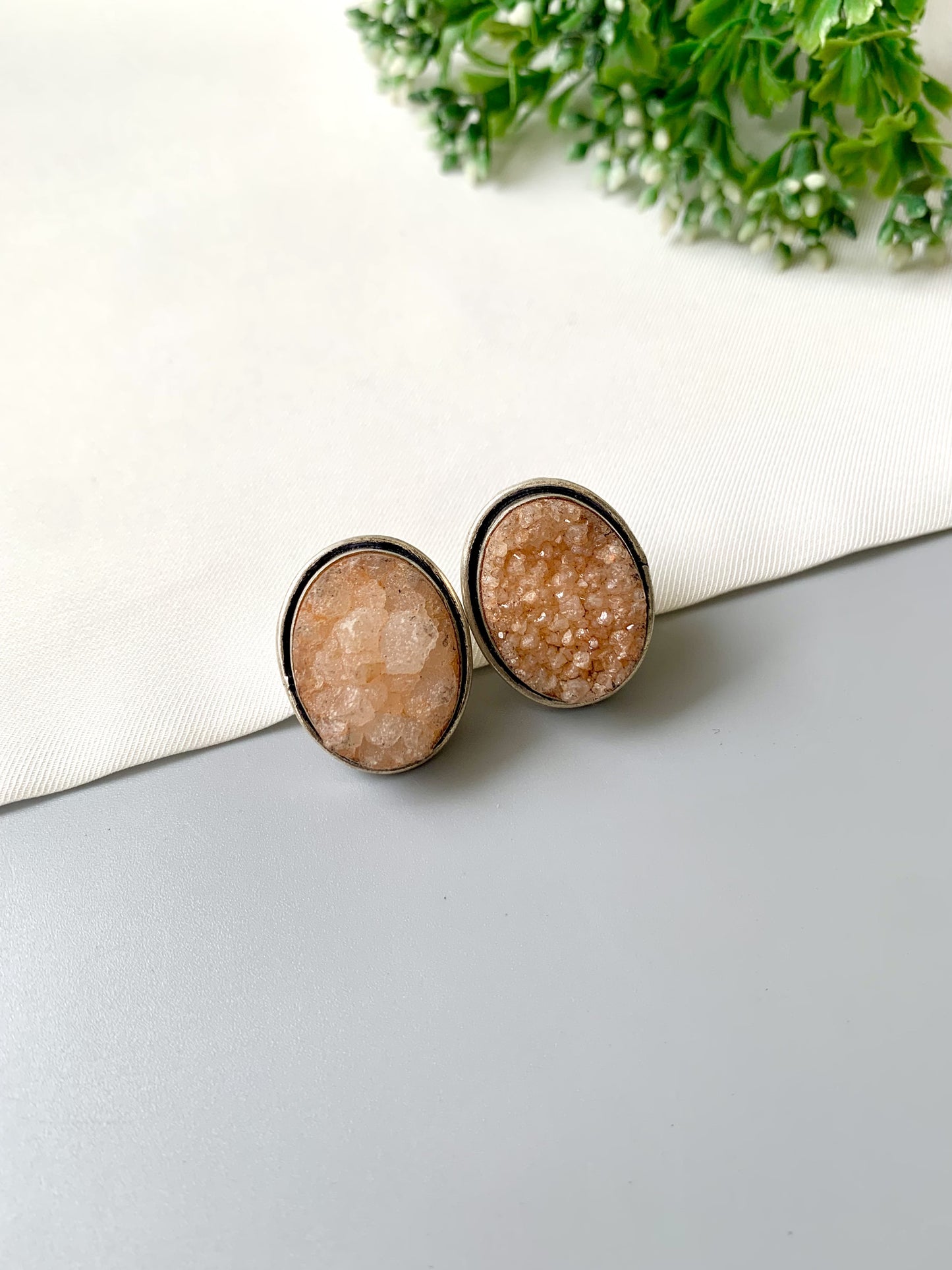 Nyra Soleil Druzy Studs in rhodium plating with natural peach druzy gemstone by Zamal Jewels