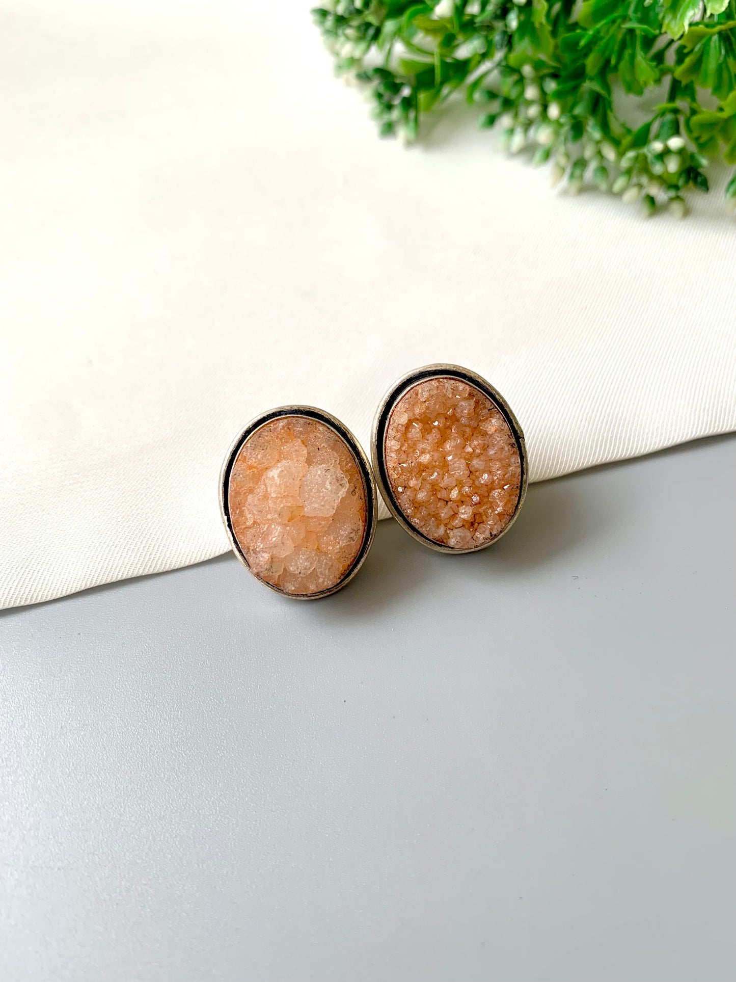 Nyra Soleil Druzy Studs in rhodium plating with natural peach druzy gemstone by Zamal Jewels