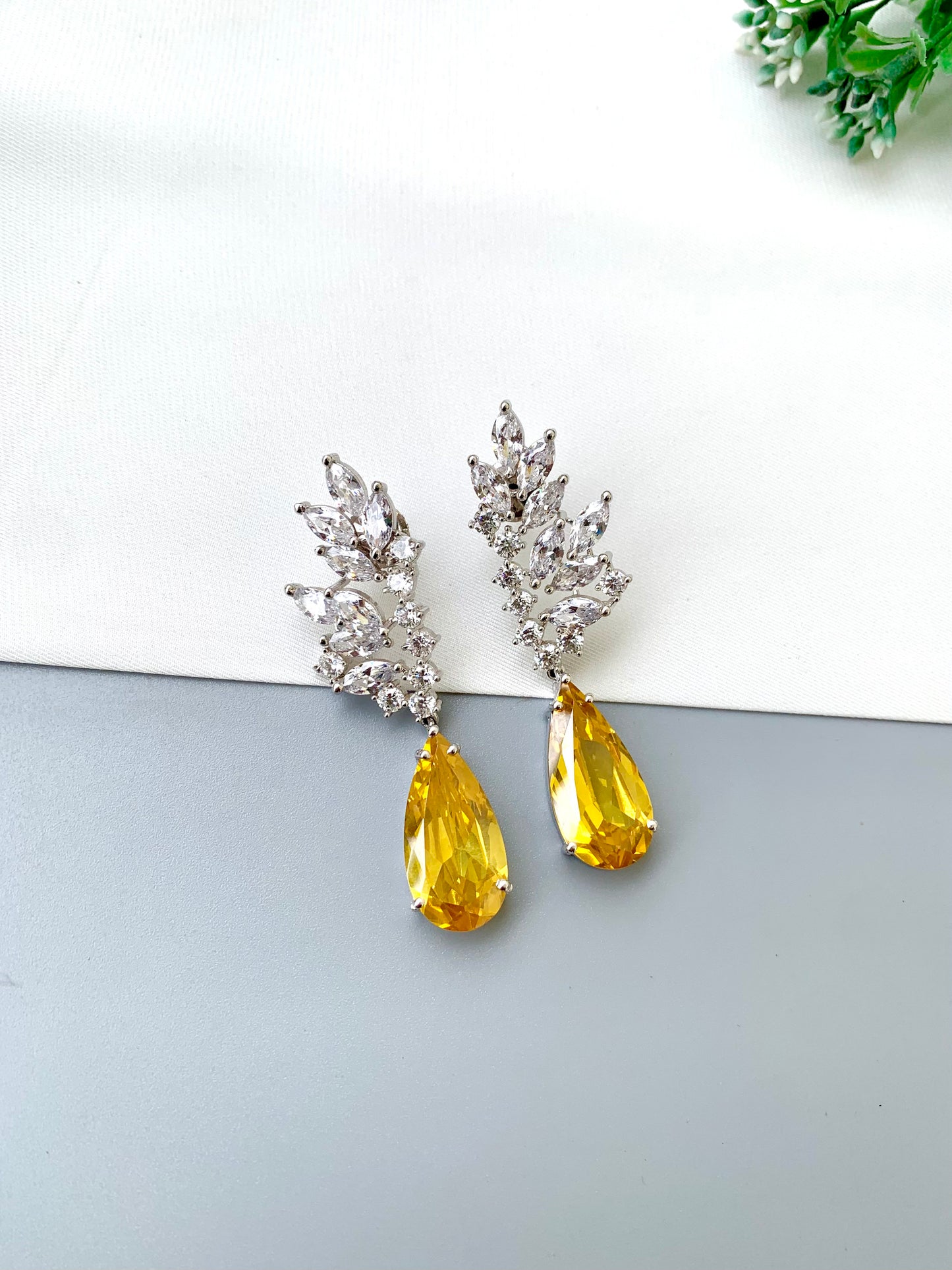Rehma handcrafted rhodium plated earrings with diamond polish, American Diamonds and semi-precious Citrine