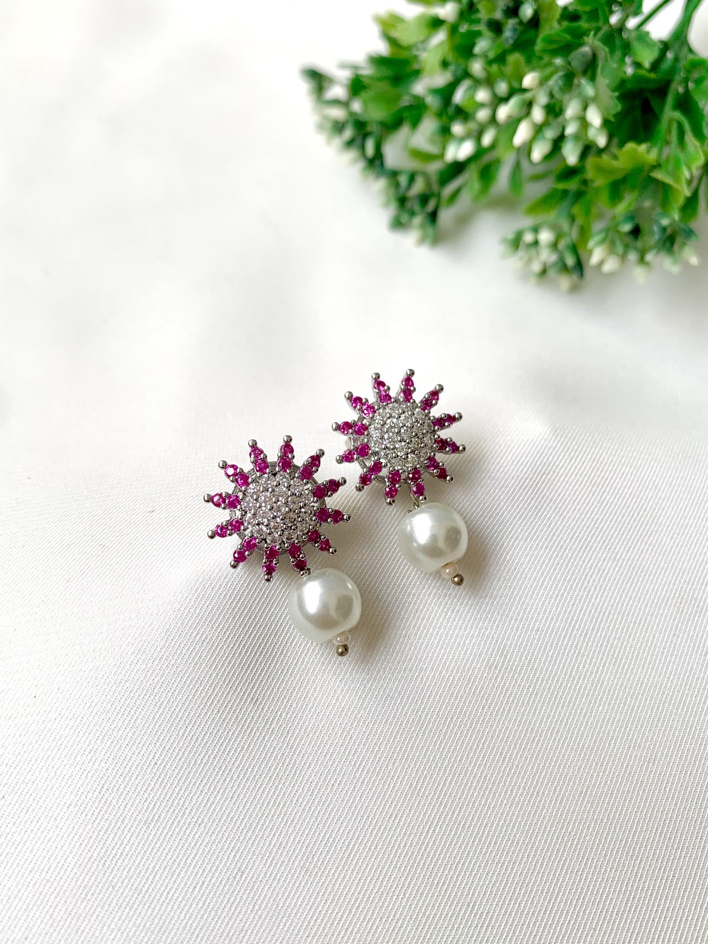Rosara pink sunburst crystal studs with pearl drop, 22K gold plated on 316L stainless steel by Zamal Jewels.