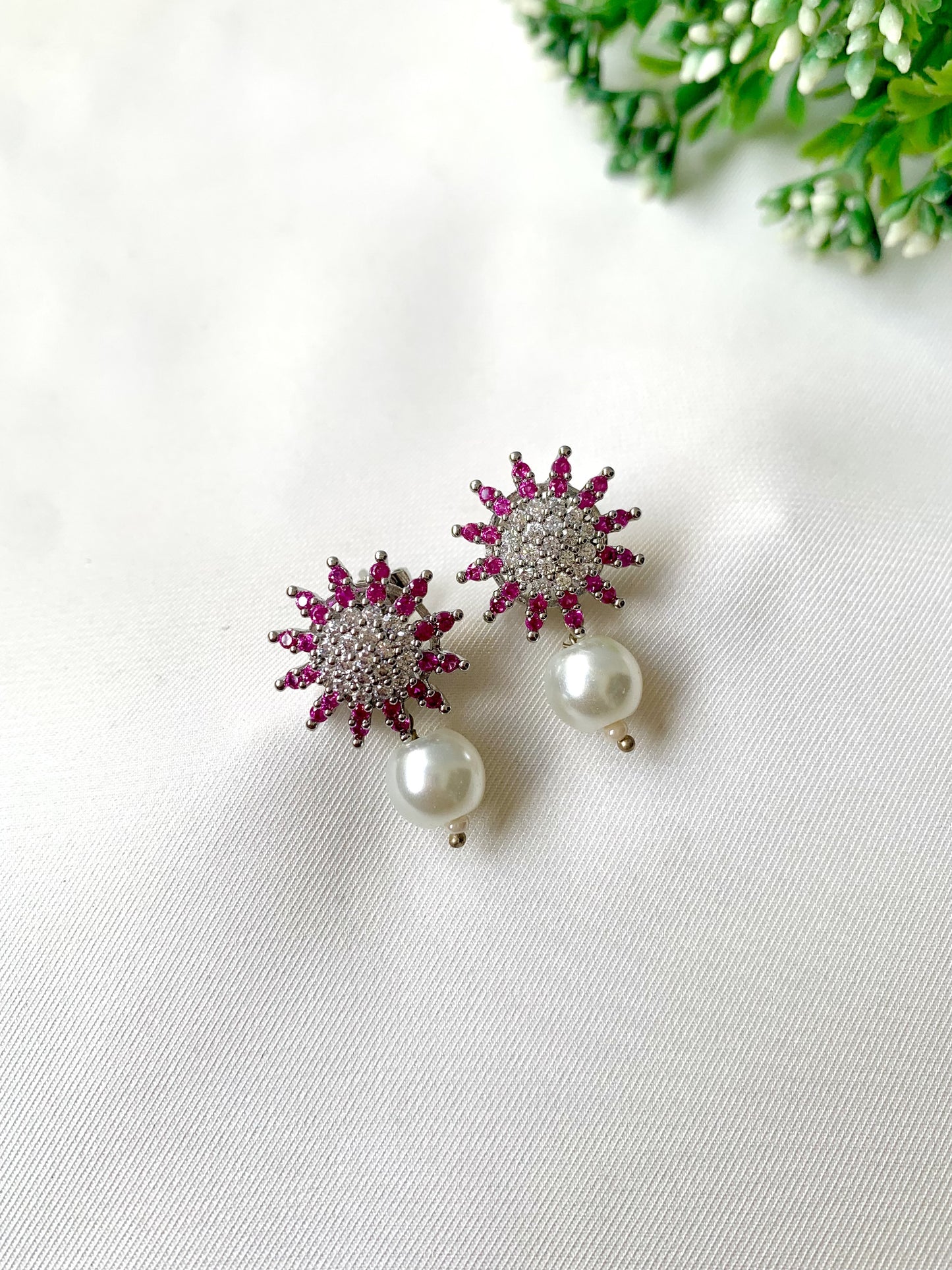 Rosara pink sunburst crystal studs with pearl drop, 22K gold plated on 316L stainless steel by Zamal Jewels.