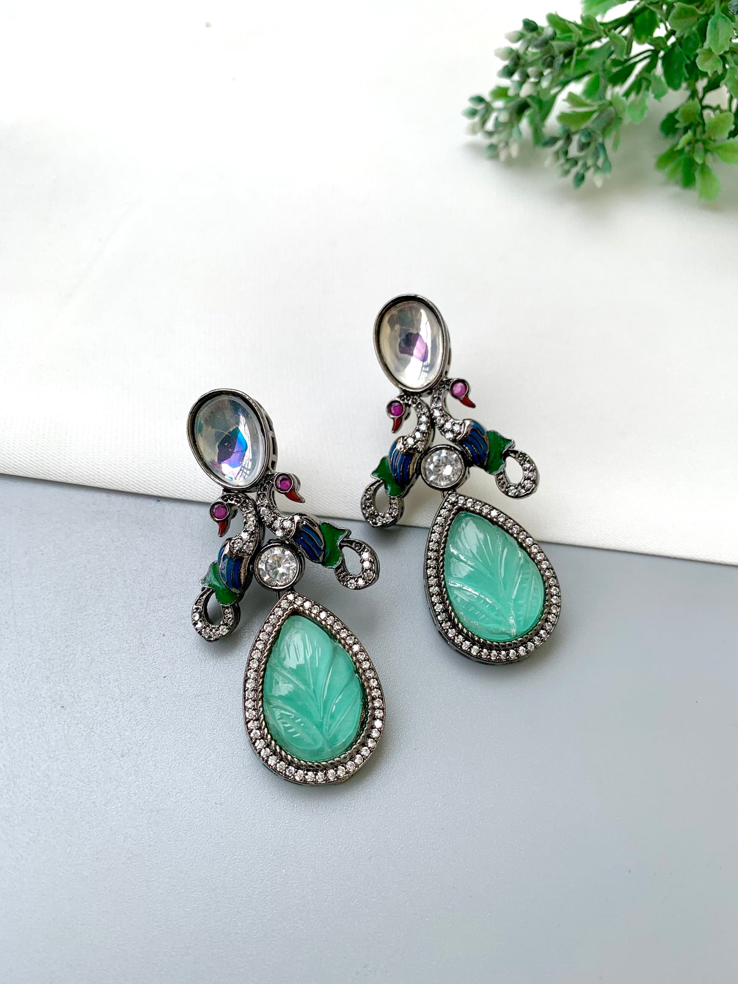 Vimsa handcrafted peacock earrings with American Diamonds, Polki Kundan and hand-carved semi-precious Onyx in black oxidized rhodium finish