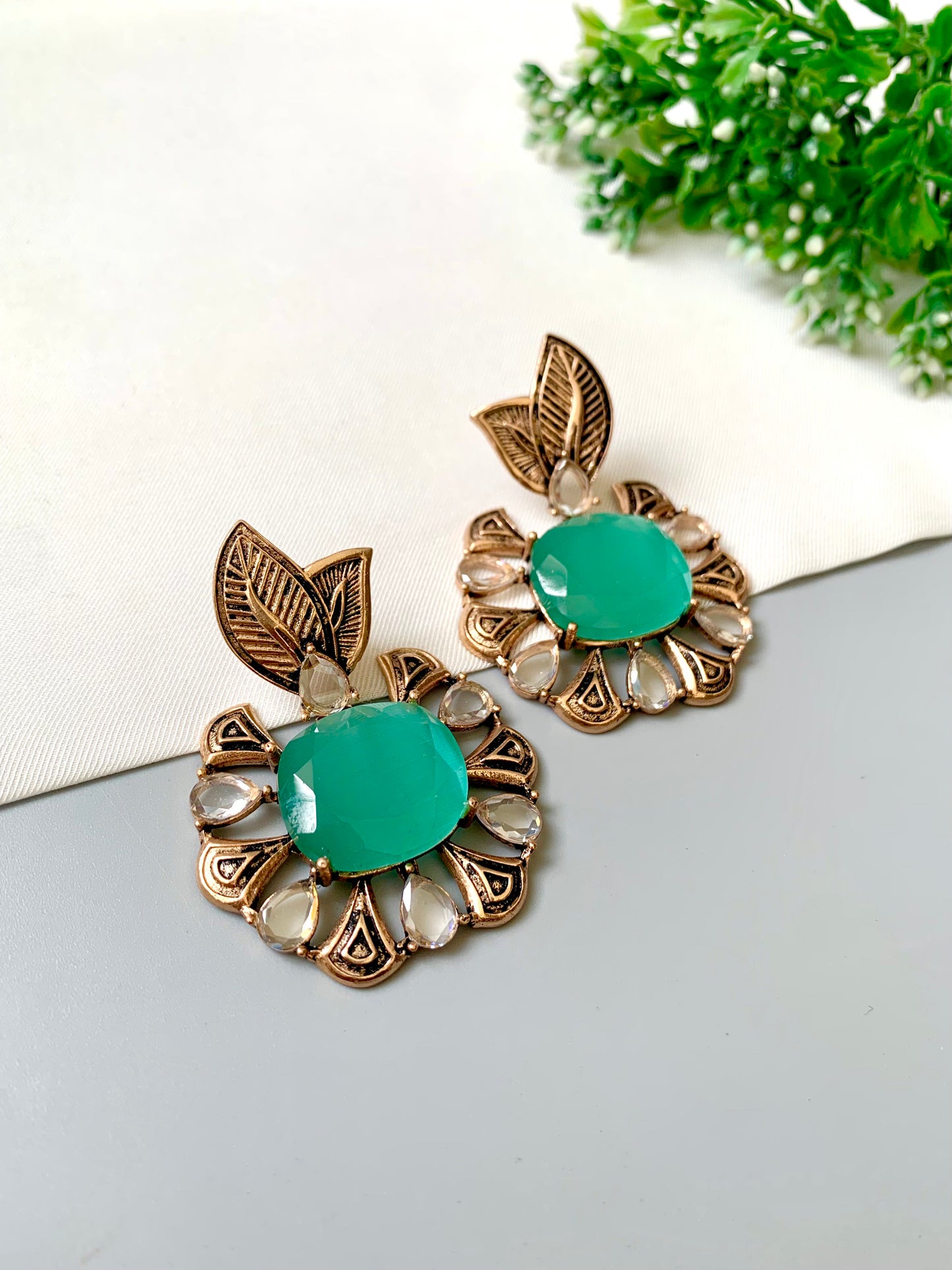 Hand-crafted Zarmina Earrings in semi-precious Mint Onyx with Polki diamonds, hand-painted Meena, and 22kt Victorian Gold matte plating by Zamal Jewels.