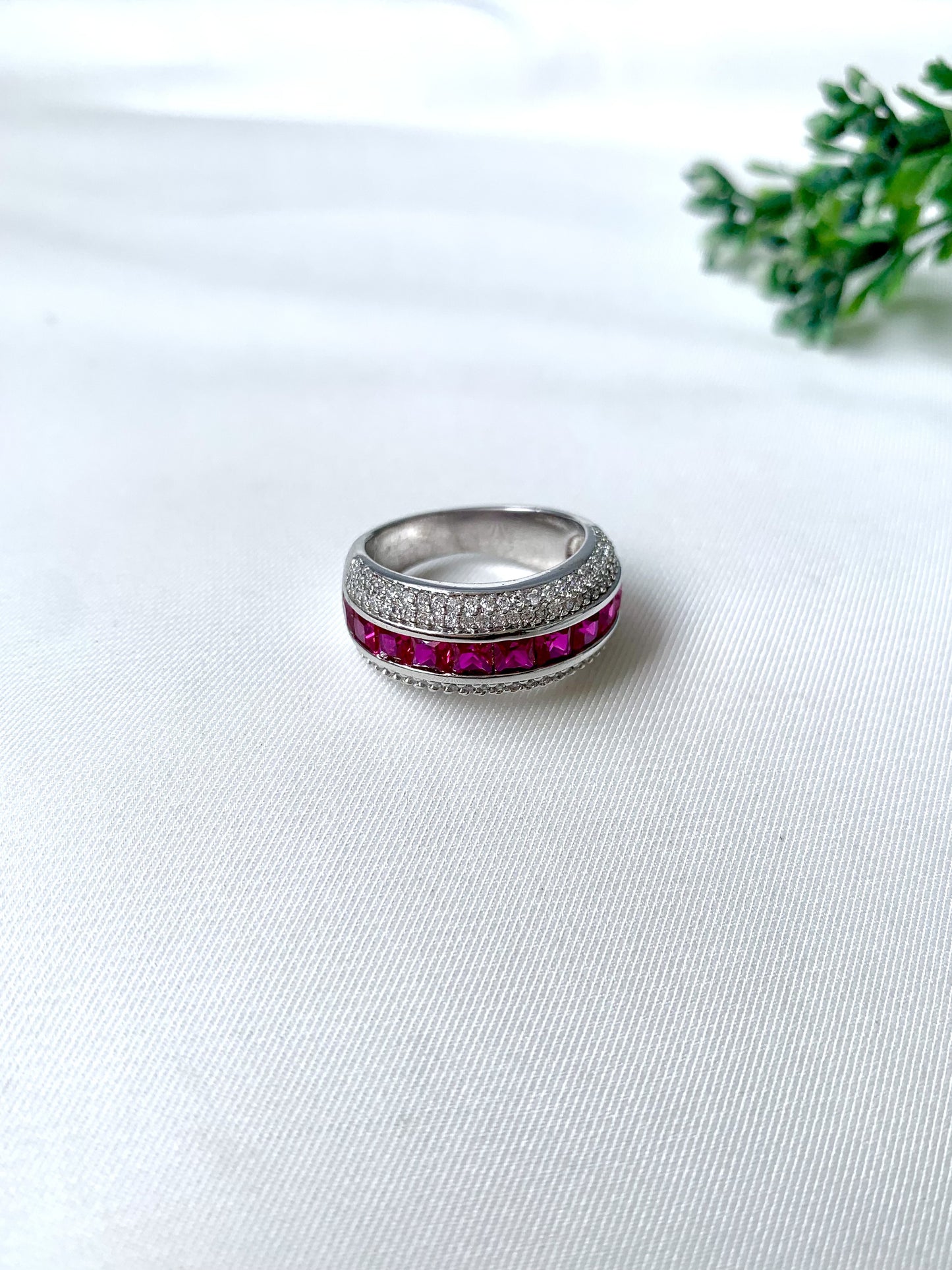 Amira Rouge Ring from Zamal Jewels featuring ruby stones and American Diamonds in rhodium finish