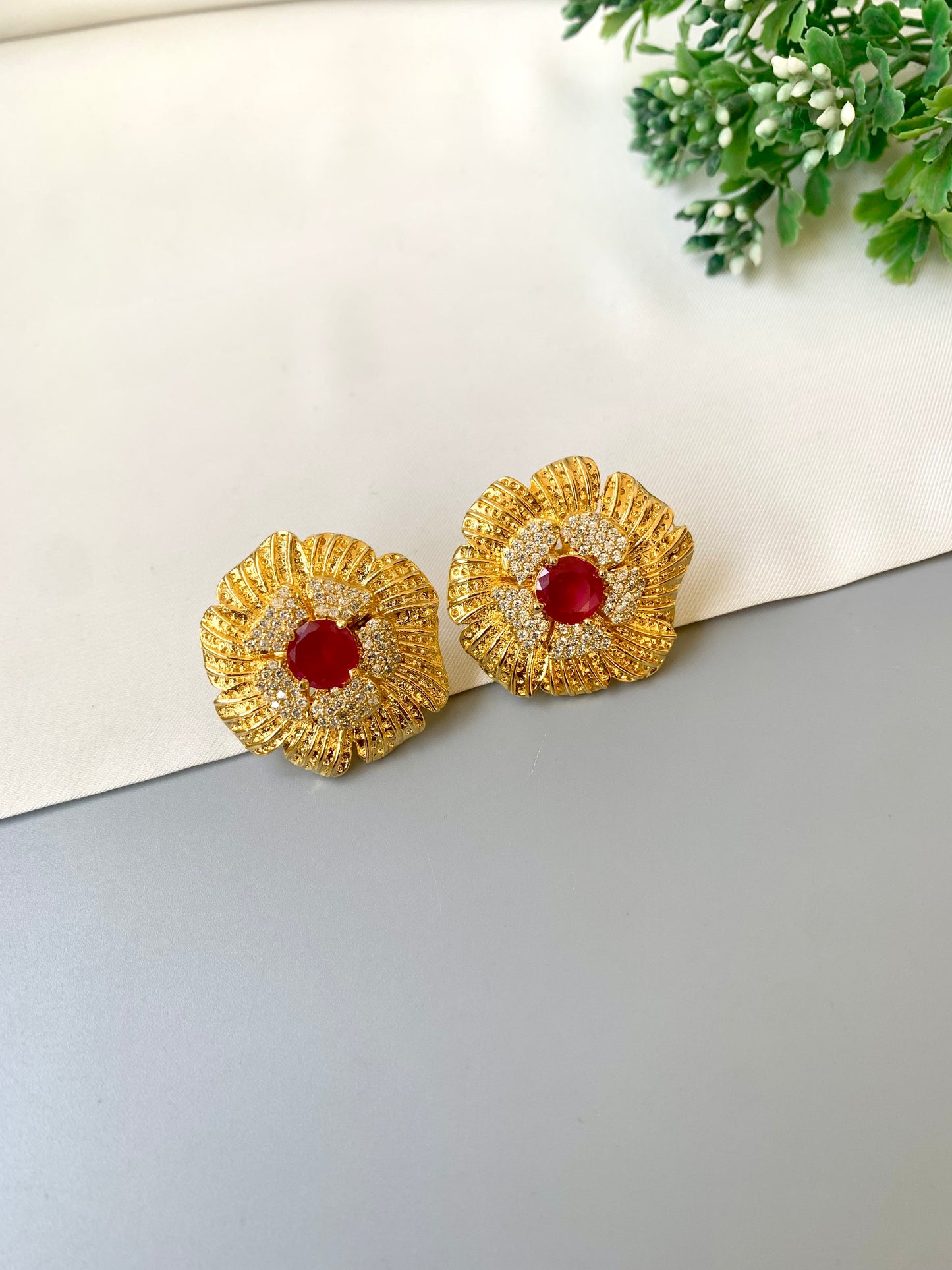 Hand crafted Crimson Studs in 22kt gold plating with American diamonds and semi-precious ruby stones