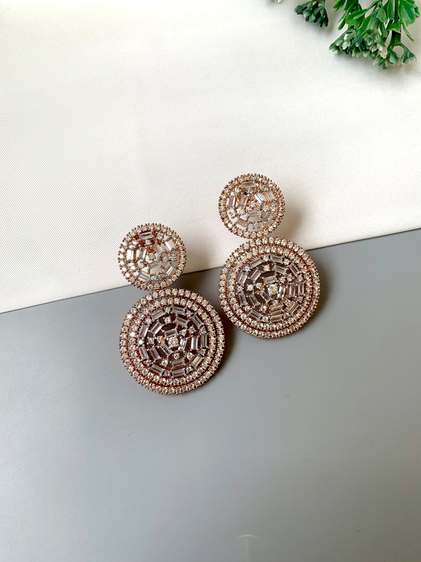 Erika handcrafted rose gold earrings with high quality American diamonds