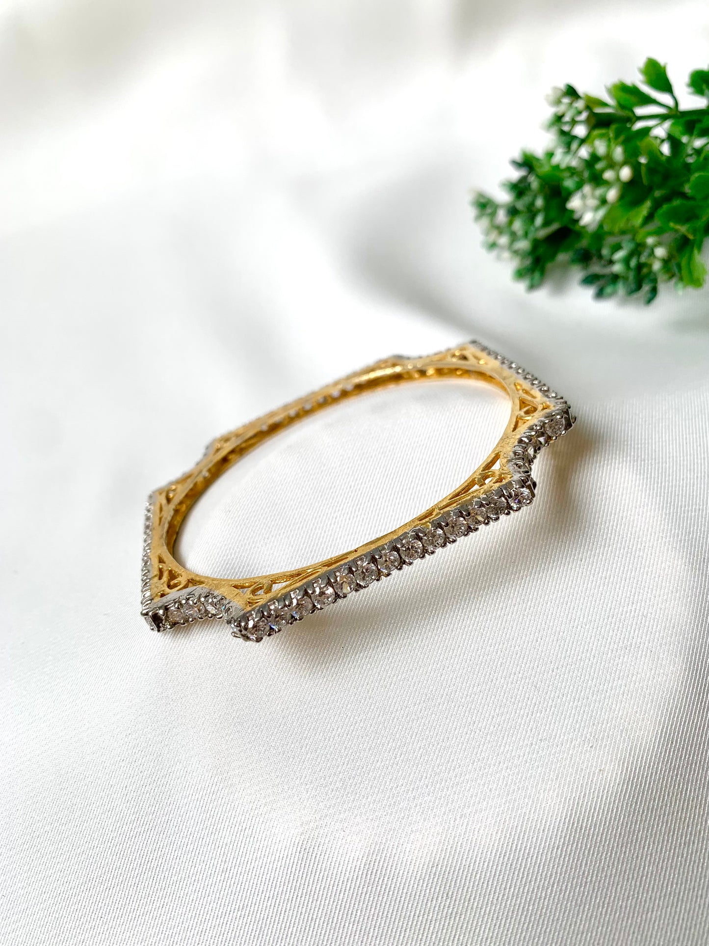 Handcrafted 22kt gold plated bangle with high quality American Diamonds in a crown silhouette, fits size 2.4 and 2.6