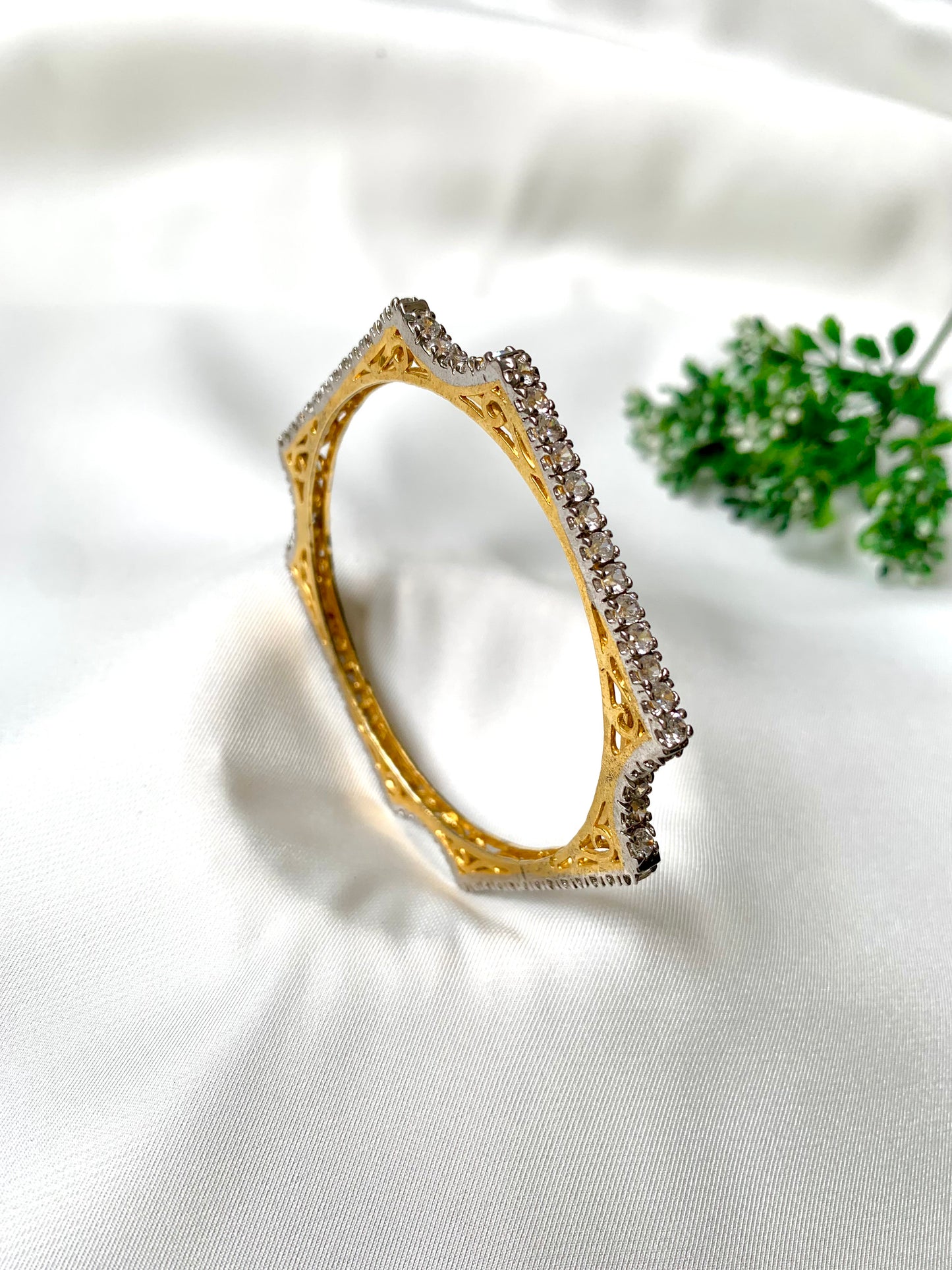 Handcrafted 22kt gold plated bangle with high quality American Diamonds in a crown silhouette, fits size 2.4 and 2.6