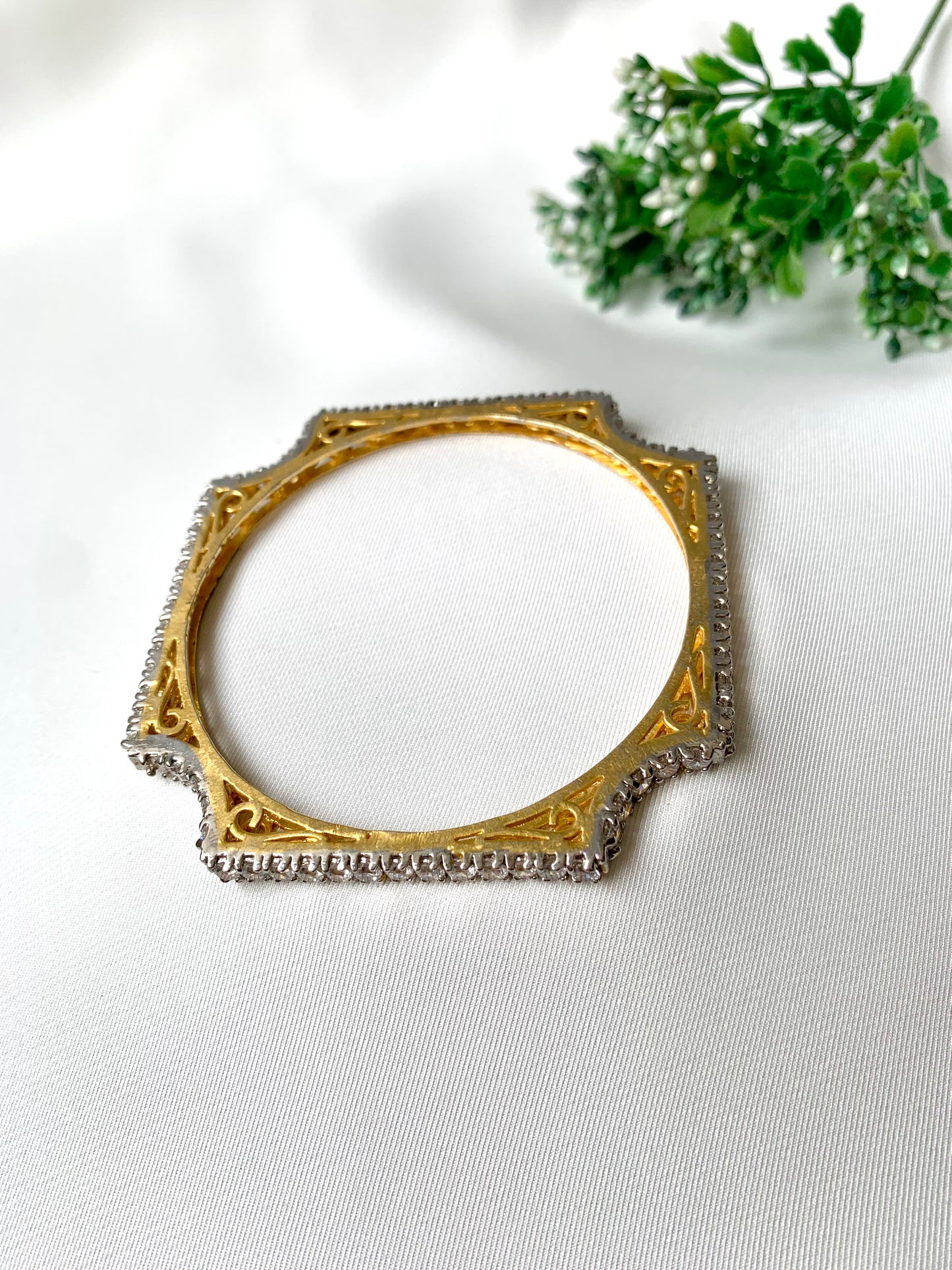 Handcrafted 22kt gold plated bangle with high quality American Diamonds in a crown silhouette, fits size 2.4 and 2.6