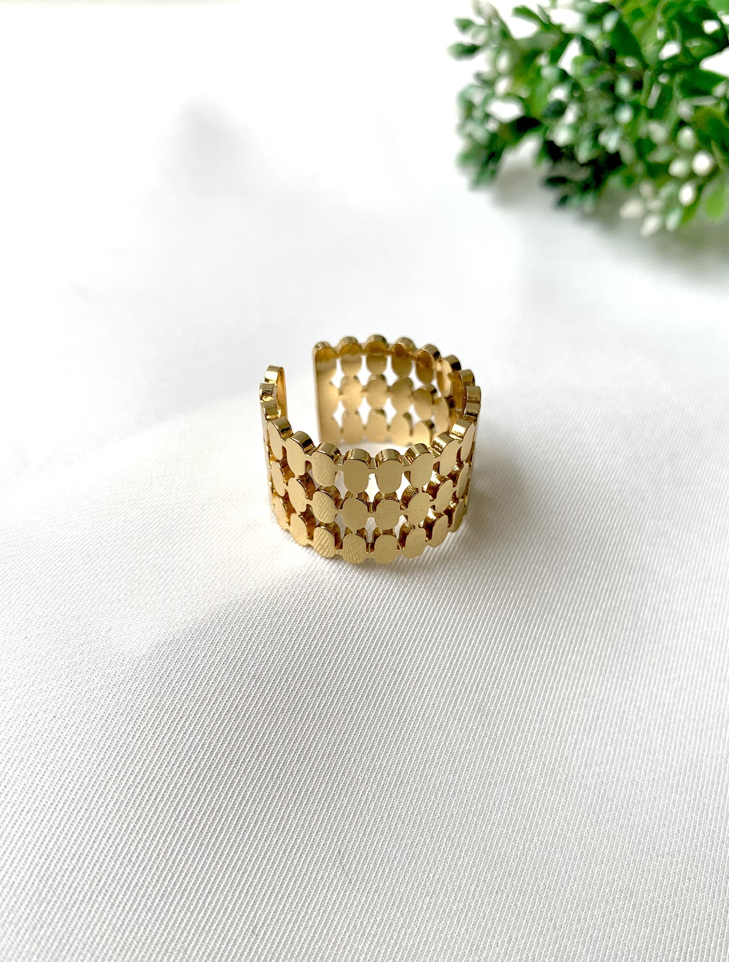 Gold-plated adjustable ring with geometric loops, part of Zamal Jewels' Forma Collection