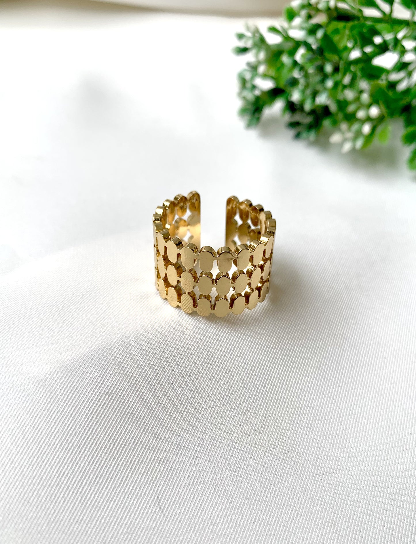 Gold-plated adjustable ring with geometric loops, part of Zamal Jewels' Forma Collection