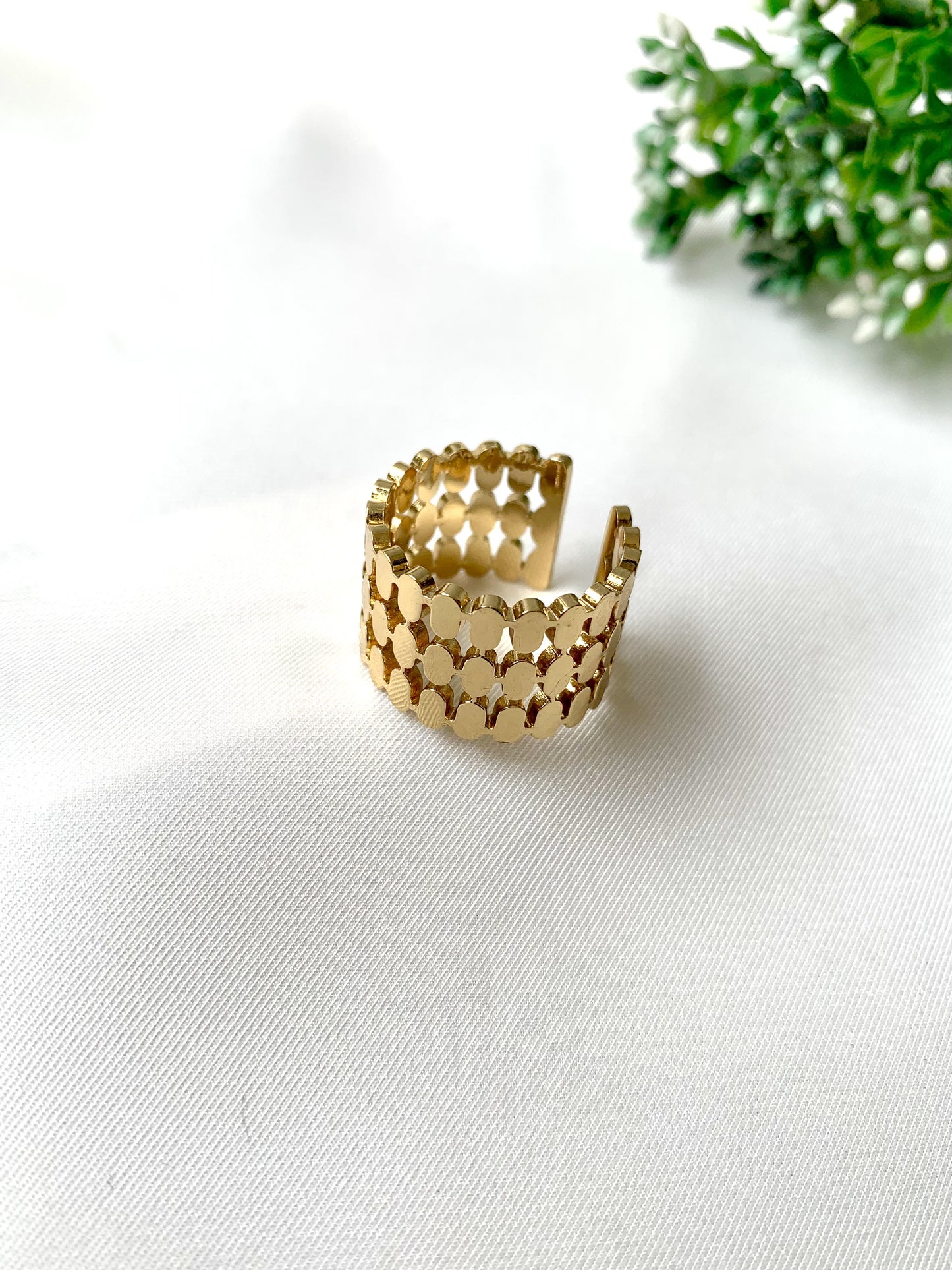 Gold-plated adjustable ring with geometric loops, part of Zamal Jewels' Forma Collection