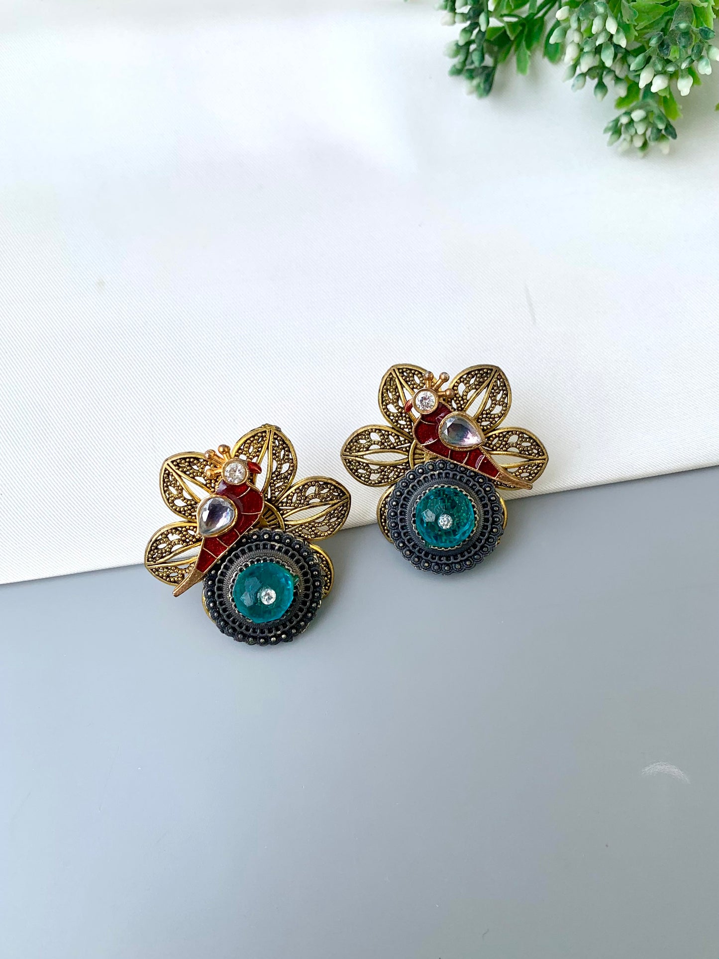 Maya aqua polki kundan earrings in gold plating with oxidized finish