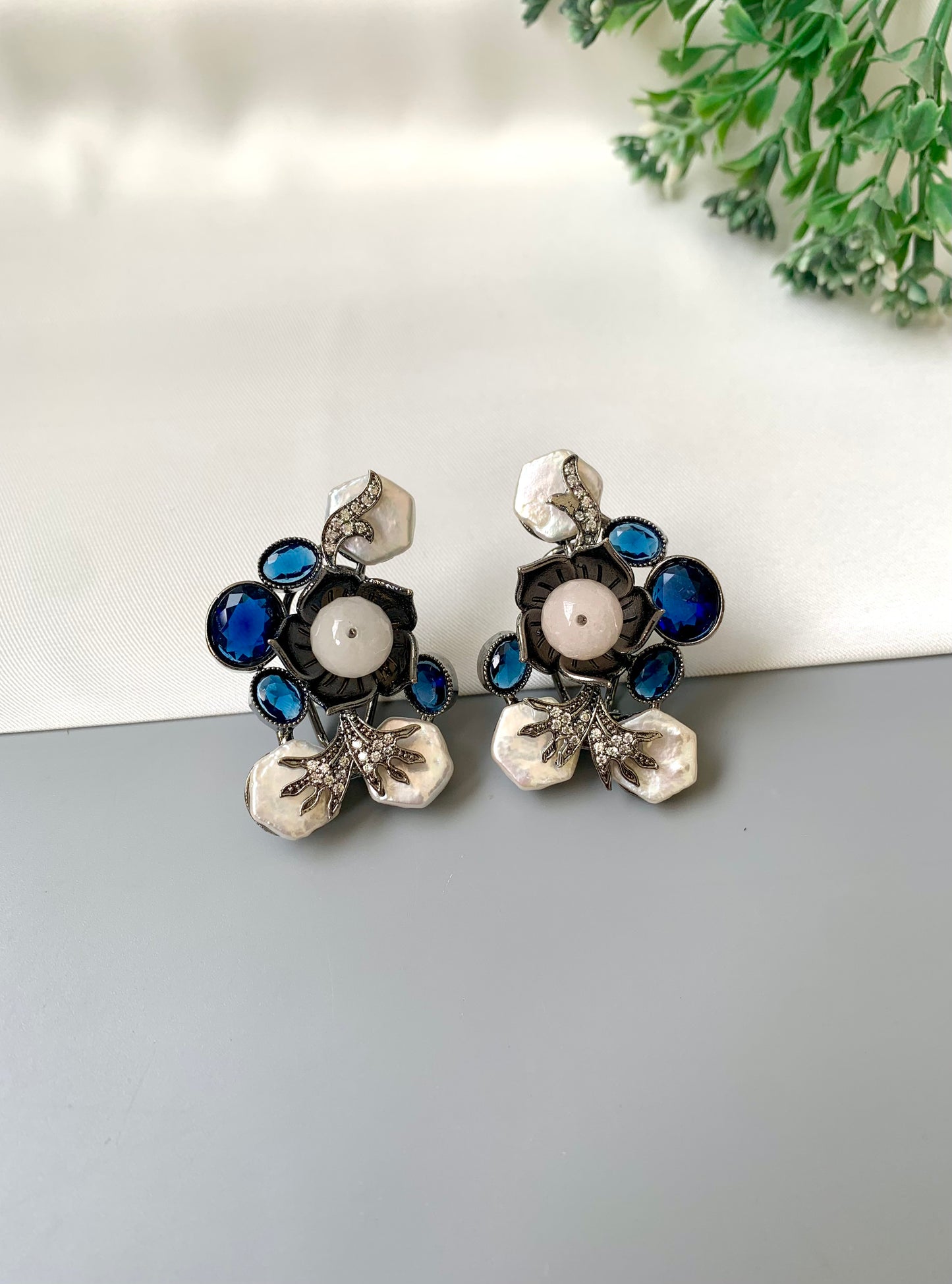 Mirana baroque pearl earrings in rhodium oxidized finish with sapphire and american diamonds