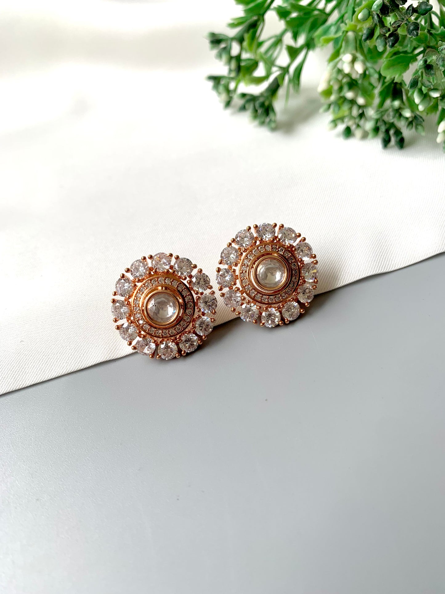 Hand crafted 22kt Rose Gold plated round Noor-e-Safed Studs featuring Polki Kundan centre and American Diamonds by Zamal Jewels
