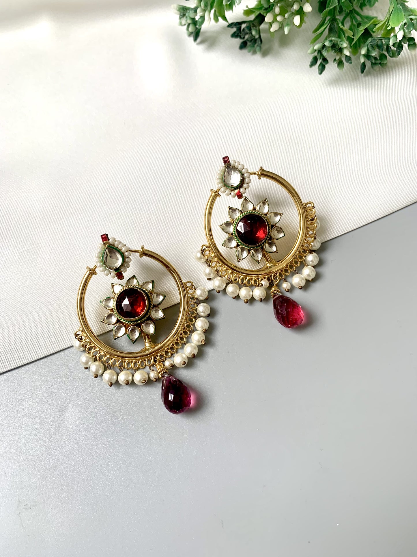 Handcrafted 22kt Gold Plated Noorani Baali Earrings with Semi-Precious Garnet, Pachi Kundan, and Pearl fringe from Zamal Jewels.