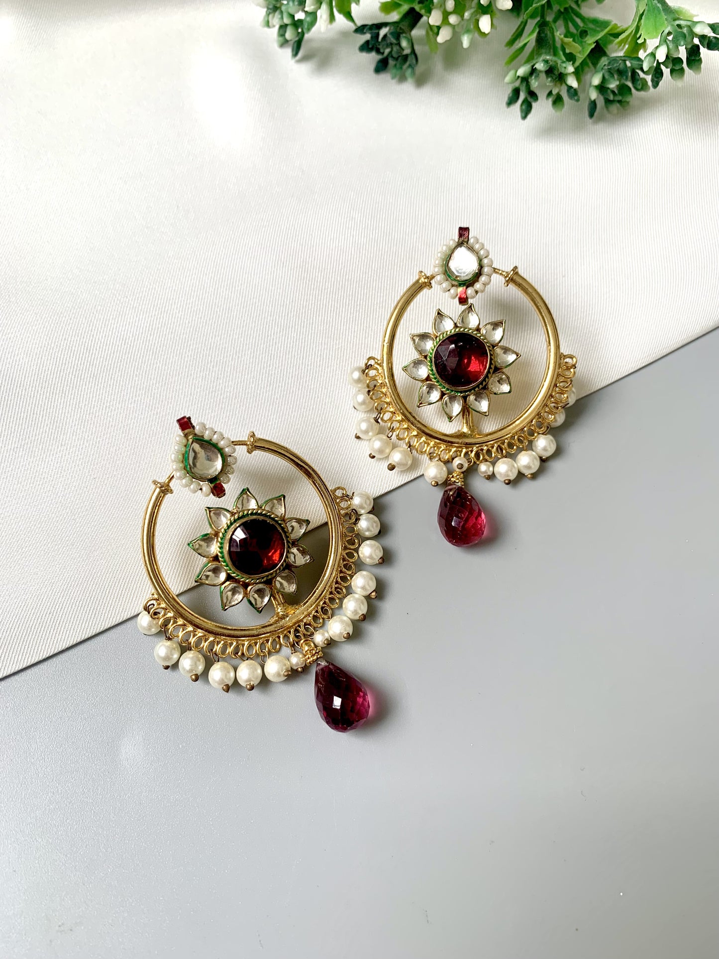 Handcrafted 22kt Gold Plated Noorani Baali Earrings with Semi-Precious Garnet, Pachi Kundan, and Pearl fringe from Zamal Jewels.