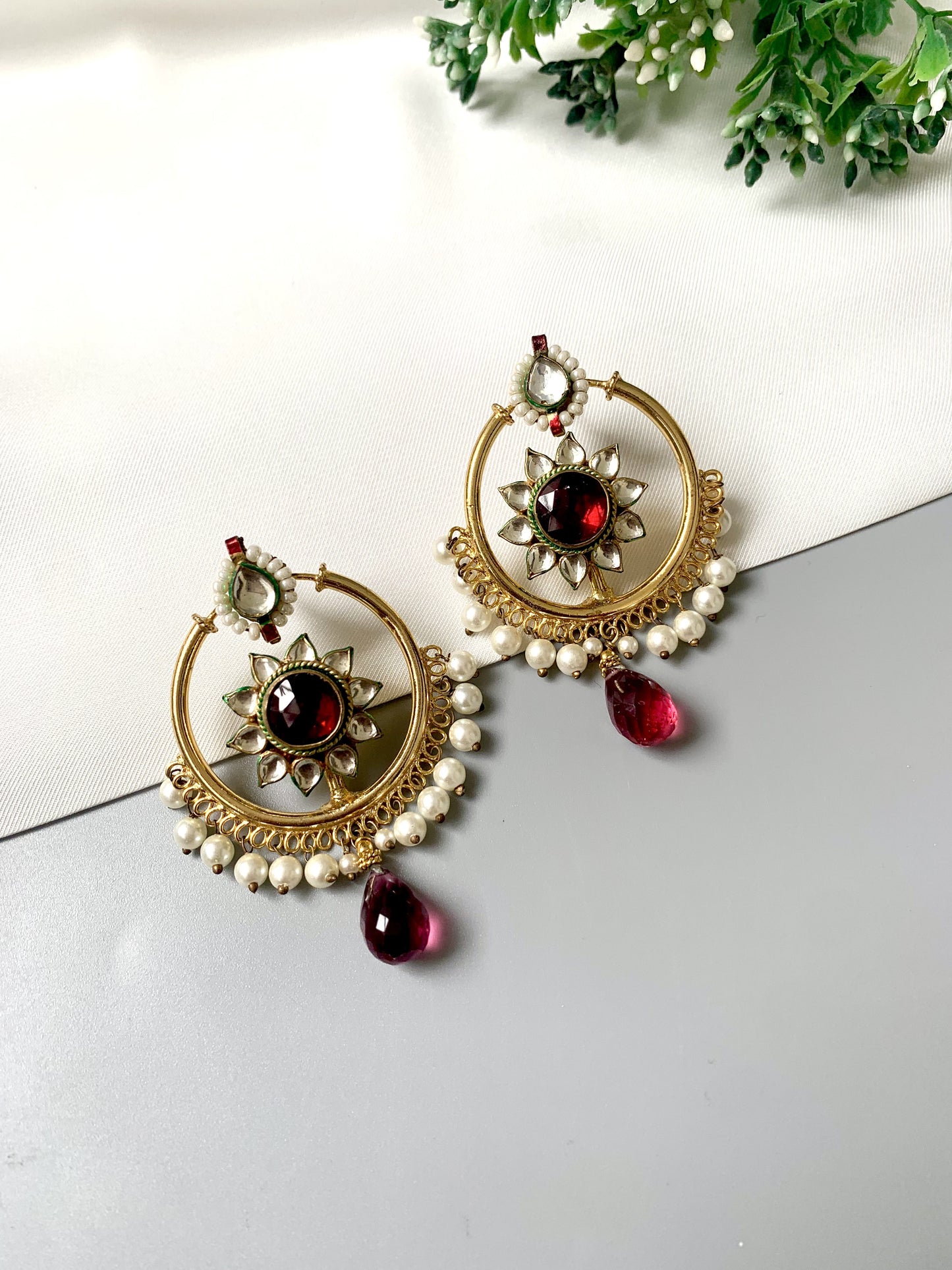 Handcrafted 22kt Gold Plated Noorani Baali Earrings with Semi-Precious Garnet, Pachi Kundan, and Pearl fringe from Zamal Jewels.