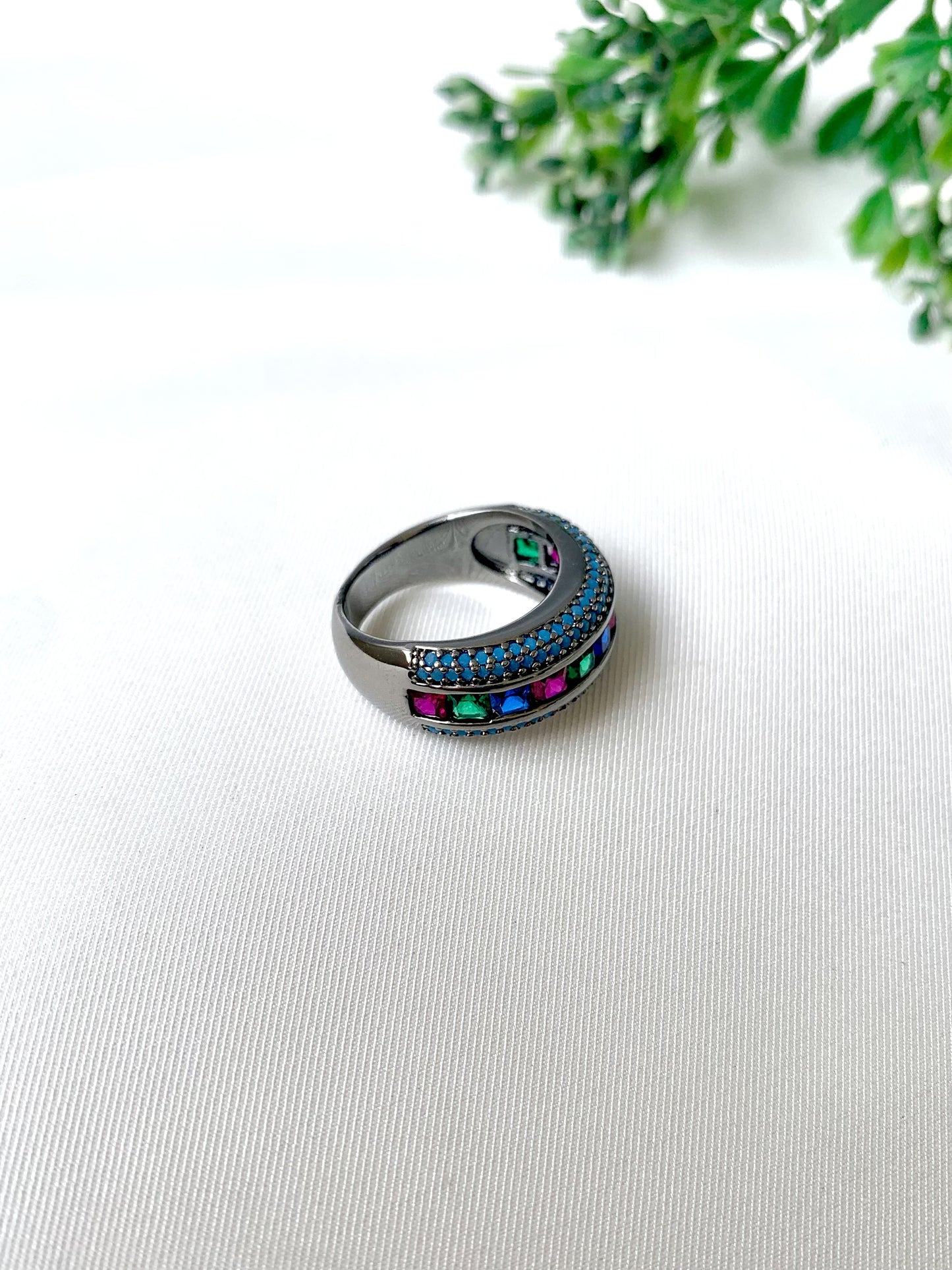 Nyra Noir handcrafted ring in oxidized rhodium polish with semi-precious ruby, emerald, and sapphire stones from Zamal Jewels