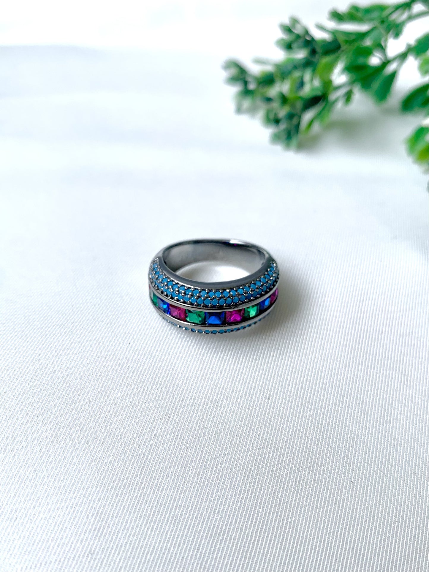 Nyra Noir handcrafted ring in oxidized rhodium polish with semi-precious ruby, emerald, and sapphire stones from Zamal Jewels