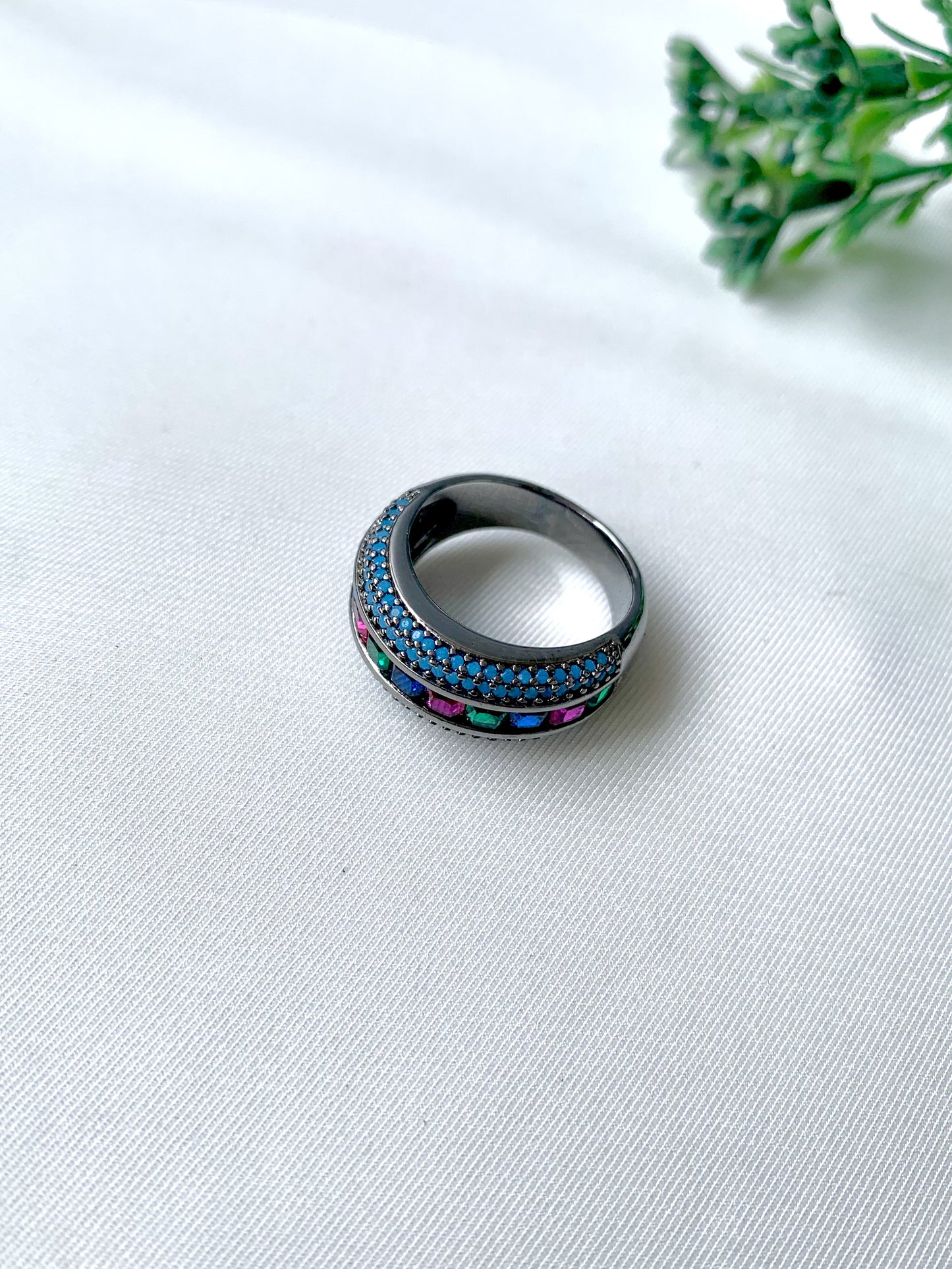 Nyra Noir handcrafted ring in oxidized rhodium polish with semi-precious ruby, emerald, and sapphire stones from Zamal Jewels