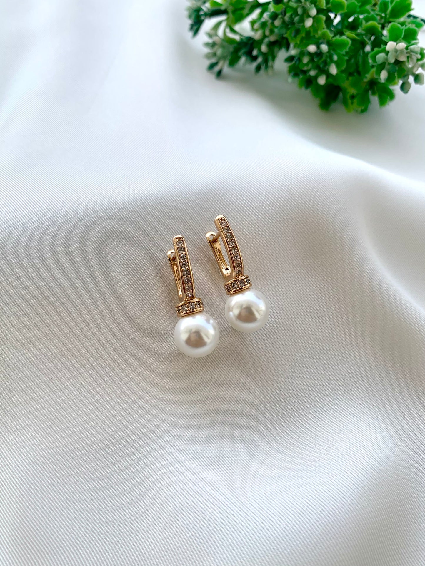 Renu rose gold plated studs with American diamonds and pearl accents