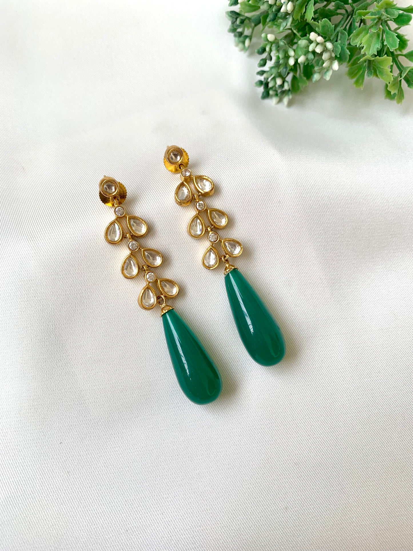 Hand crafted Rumi light green earrings featuring American Diamonds and semi-precious Polki Kundan stones