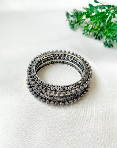 Sasha rhodium plated bangles with oxidized finish and American diamonds in stackable design