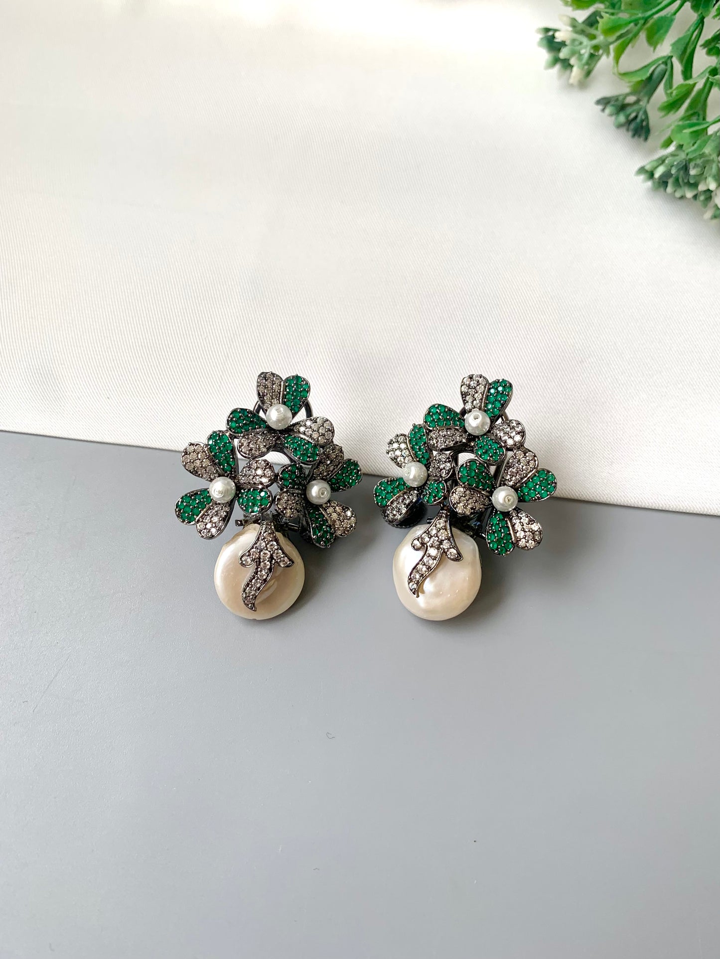 Sivah handcrafted rhodium oxidized signature earrings with baroque pearls and emerald Swarovski crystals