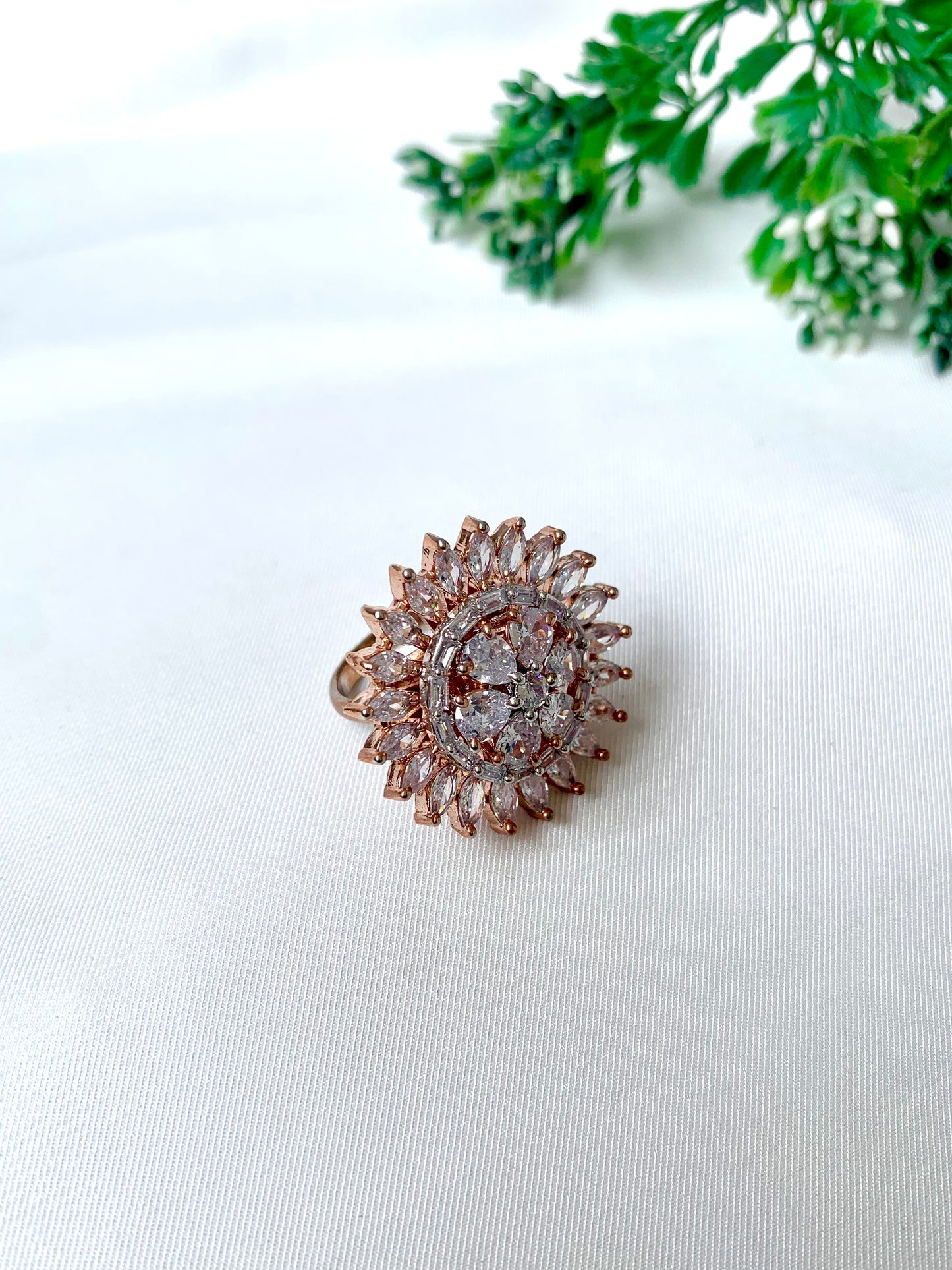Close-up of Solara Bloom Ring by Zamal Jewels in 22kt rose gold plating with American Diamonds