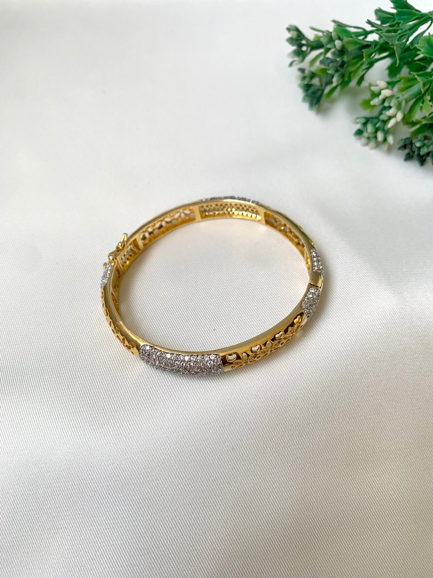Suhana gold plated bangle with American diamonds and openable screw design