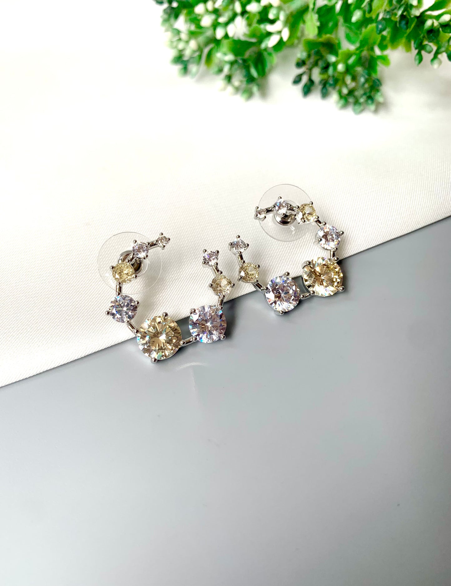 Close-up of Velena earrings with high-shine Swarovski Crystals