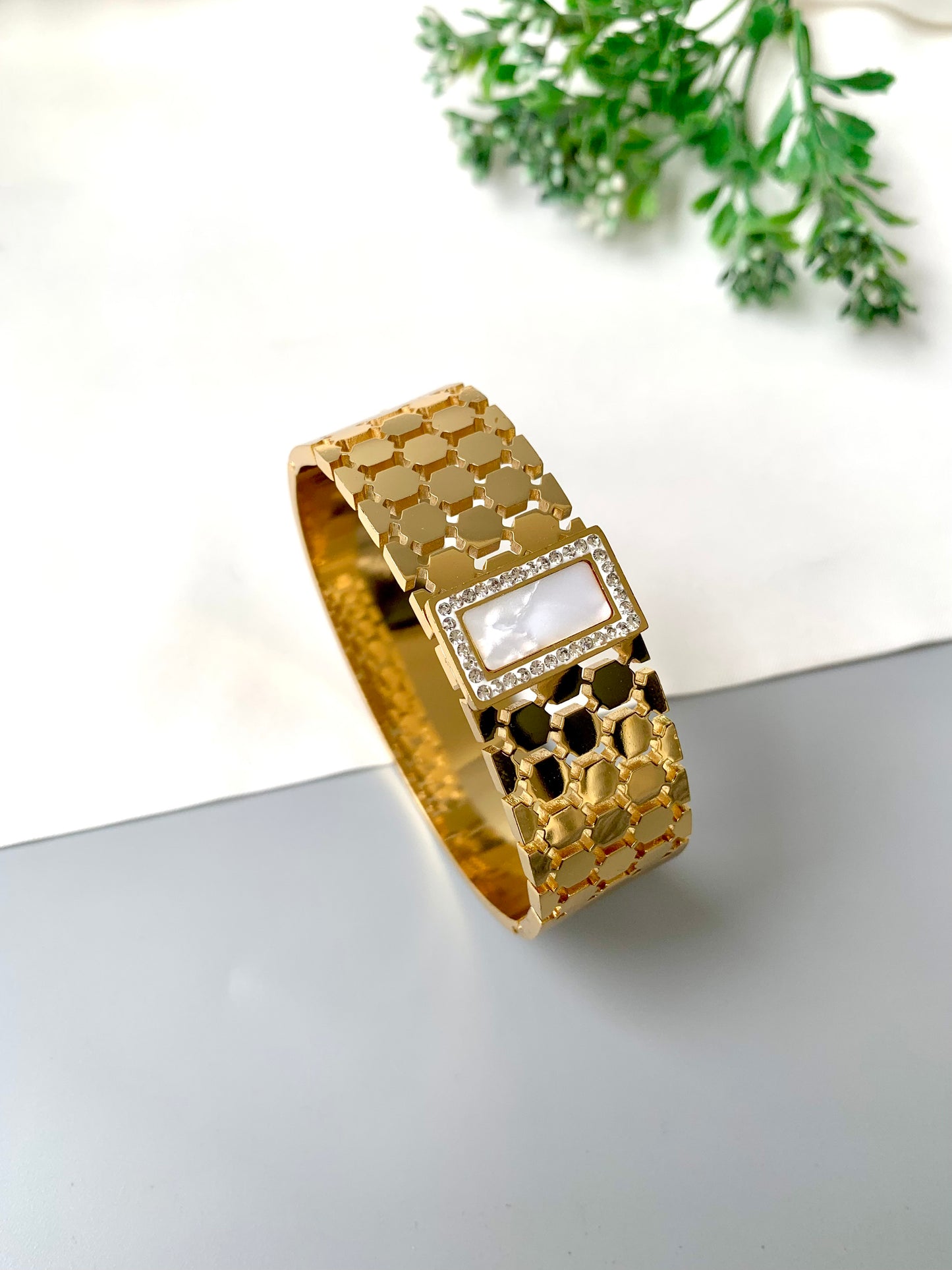 White rectangular mother of pearl bracelet with gold openable band, waterproof and tarnish-proof