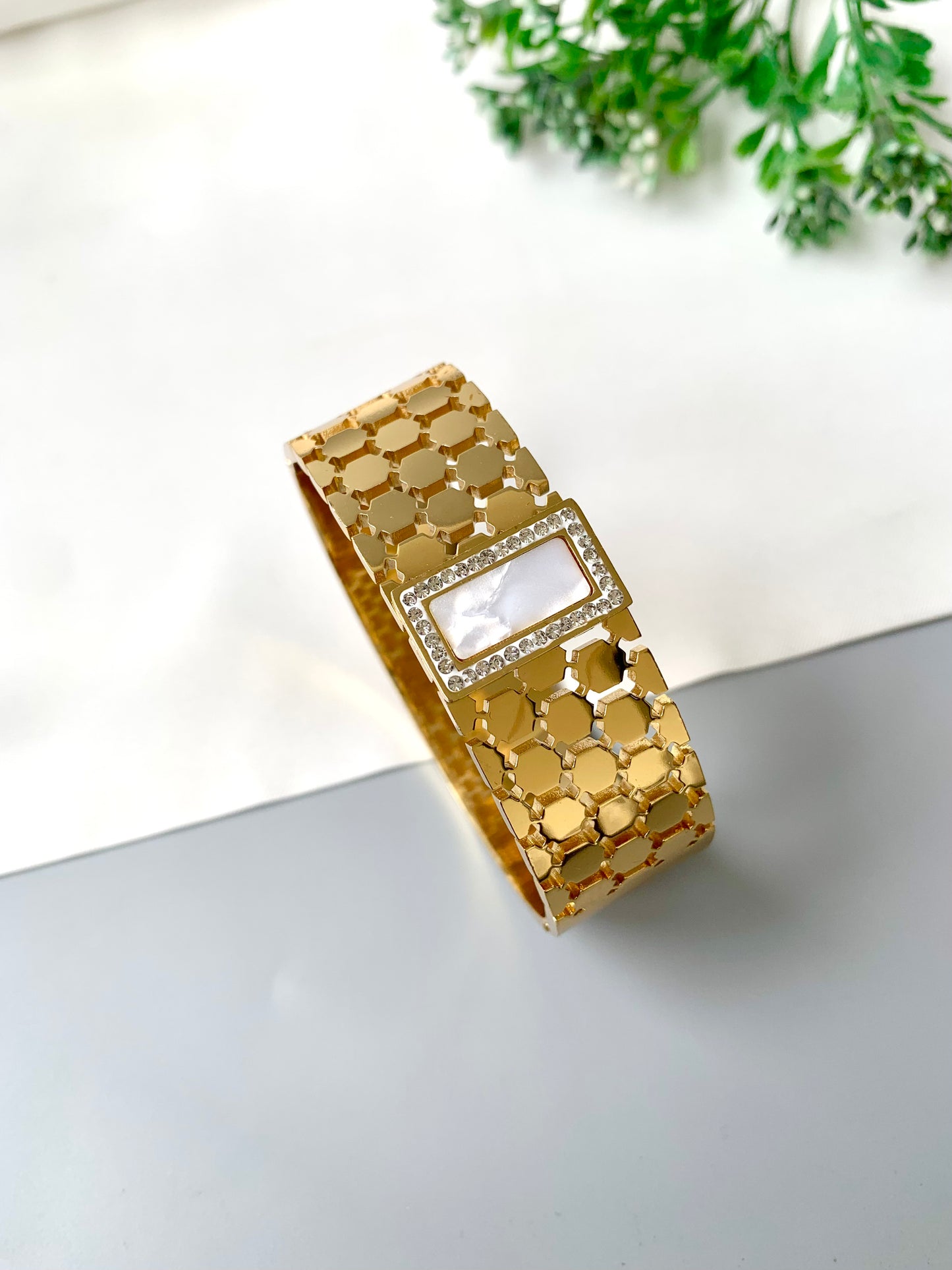 White rectangular mother of pearl bracelet with gold openable band, waterproof and tarnish-proof