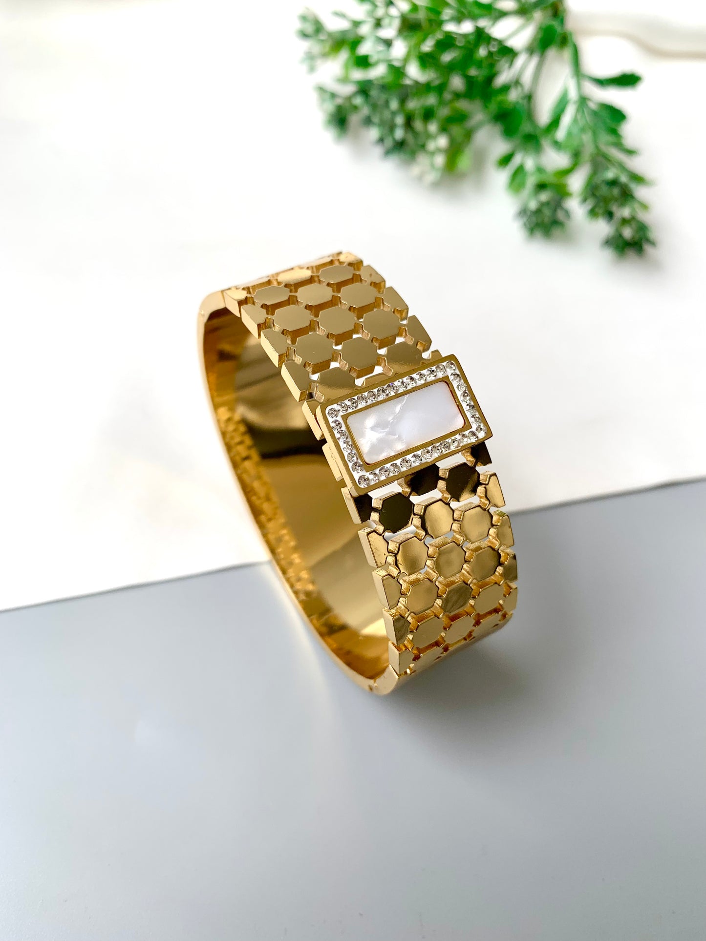 White rectangular mother of pearl bracelet with gold openable band, waterproof and tarnish-proof