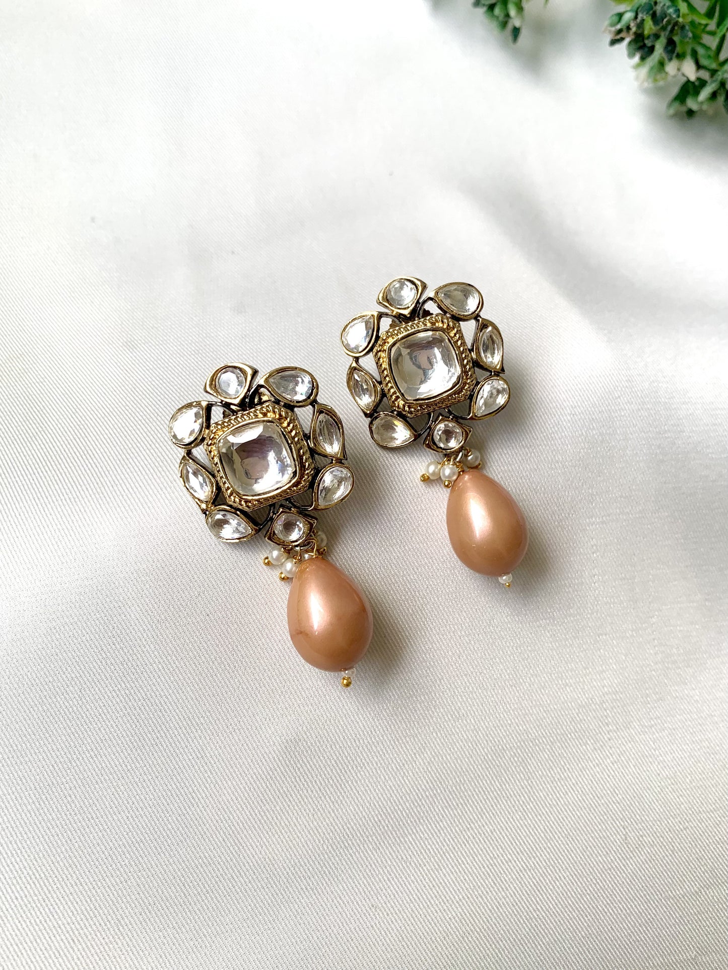 Handcrafted Zareen Earrings in Peach Pearl with Polki Kundan stones and Victorian gold finish by Zamal Jewels