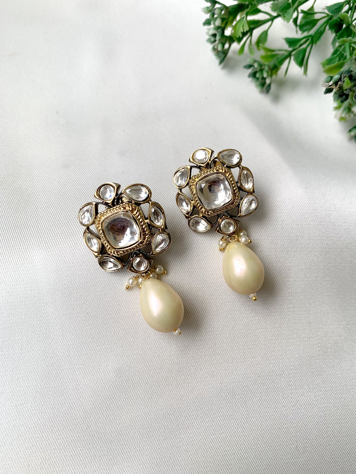 Handcrafted Zareen Earrings in White Pearl with Polki Kundan stones and Victorian gold finish by Zamal Jewels