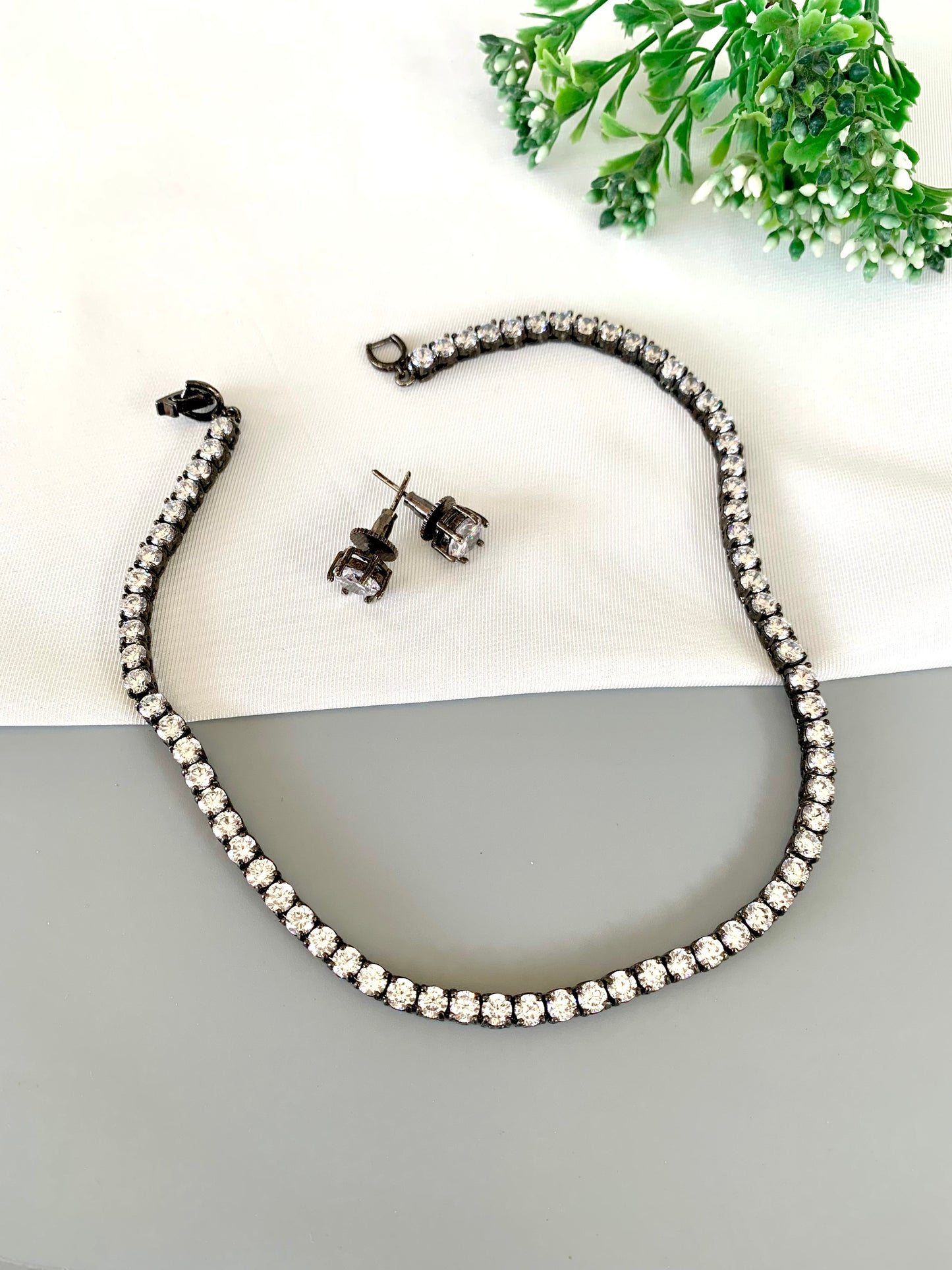 Angled view capturing the full shine and moodiness of the Zehra Necklace Set