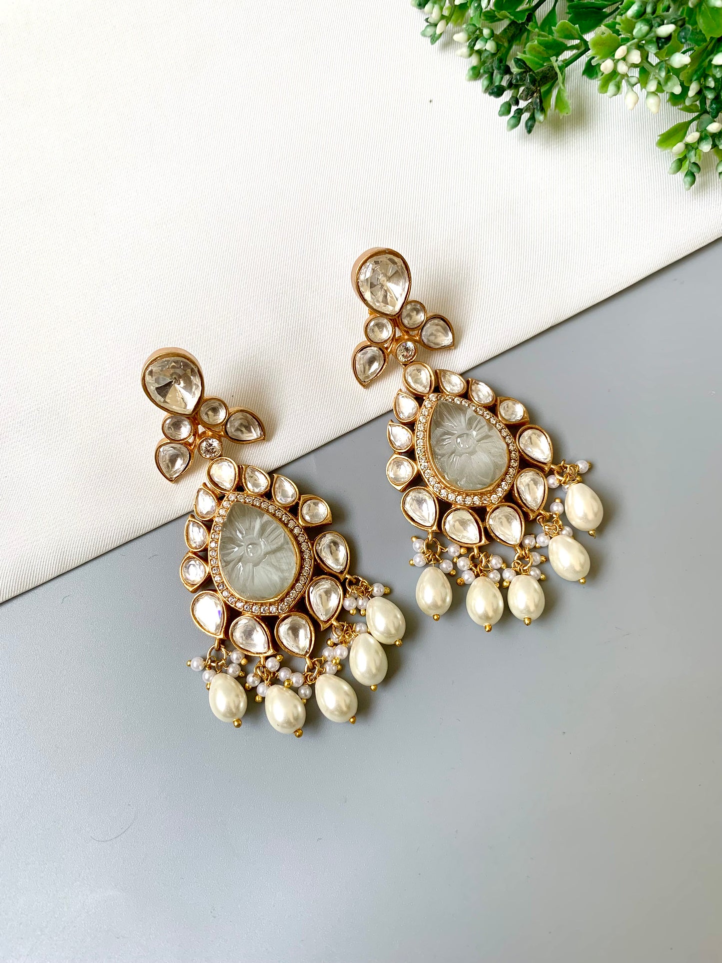Ivory and gold dangler earrings with American Diamonds and pearl drops in a floral teardrop design
