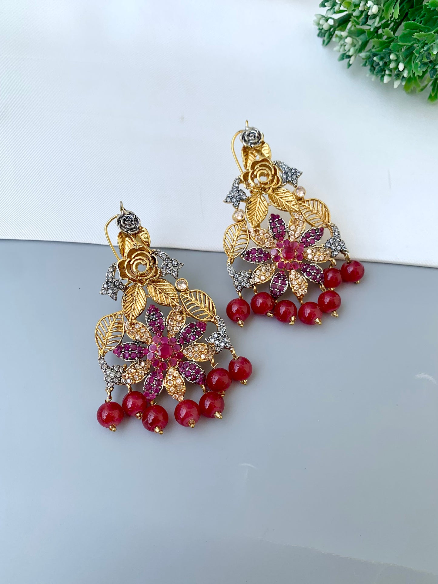 Zulehka ruby earrings in gold plating with American diamonds