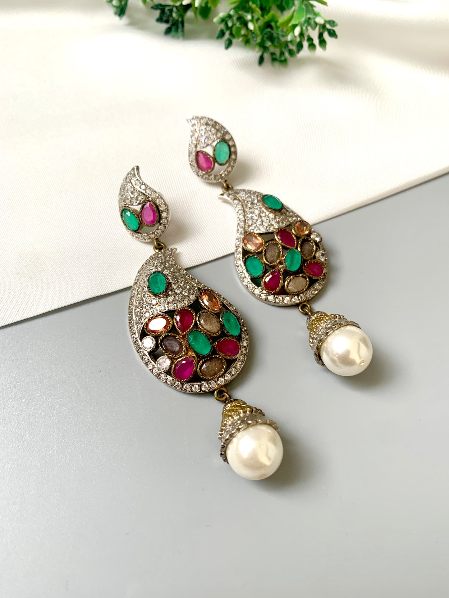 Zuleikha Gemstone Chandelier Earrings in rhodium plating with American Diamonds, Rubies, Emeralds, Sapphires, Champagne stones, and pearl drops