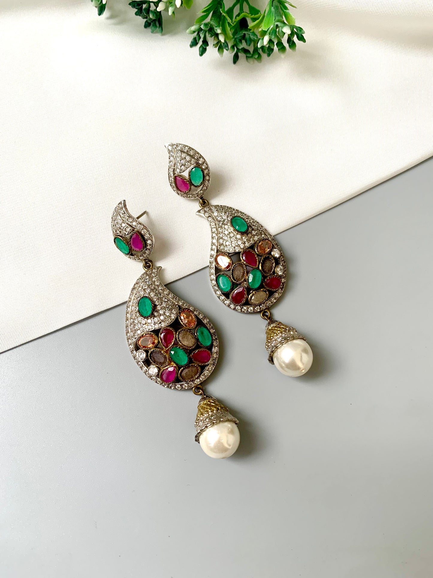 Zuleikha Gemstone Chandelier Earrings in rhodium plating with American Diamonds, Rubies, Emeralds, Sapphires, Champagne stones, and pearl drops