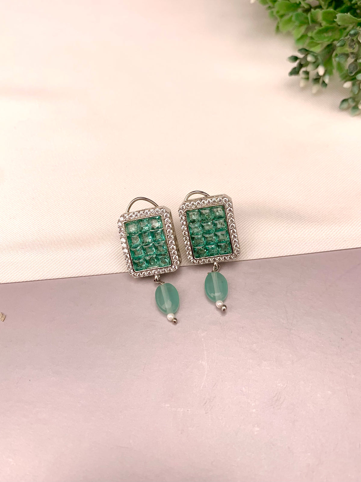 Ameena handcrafted earrings with American Diamonds and semi-precious crystals, available in Sapphire, Emerald, Mint, Ruby and Ferozi variants